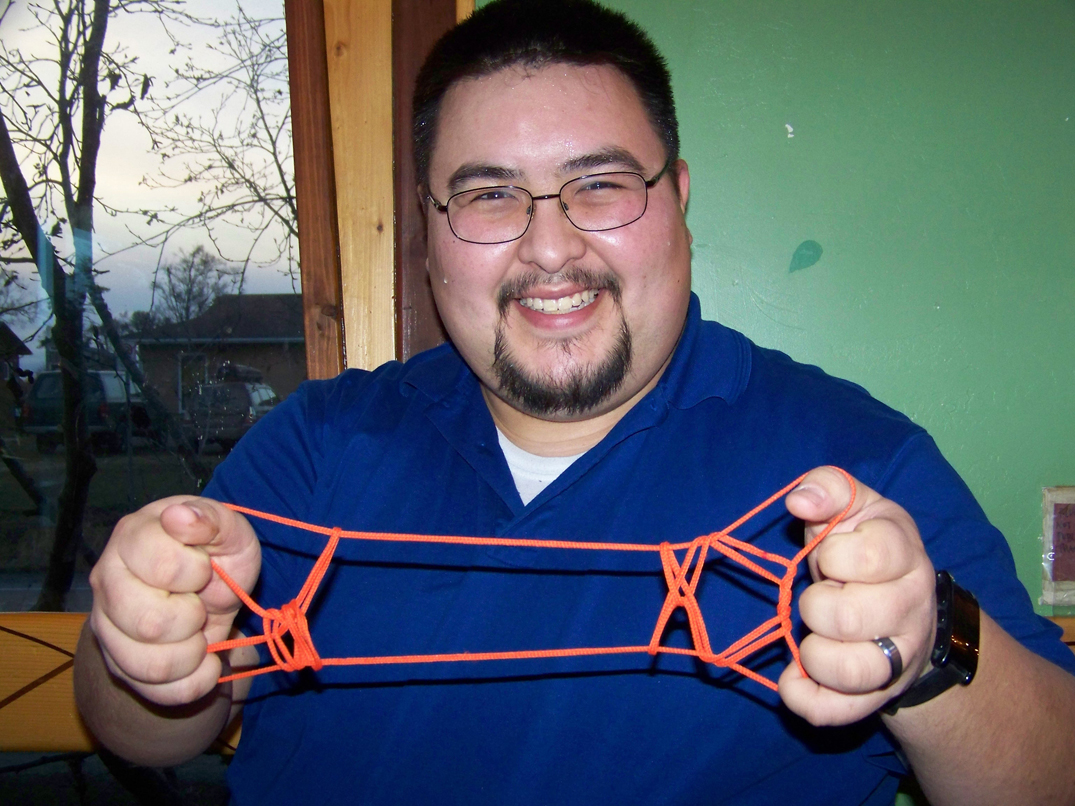 Nikolai completes his story of the encounter between Fox and Whale, with Fox on the left and the shape of Whale’s tale appearing on the right.-Photo by McKibben Jackinsky, Homer News