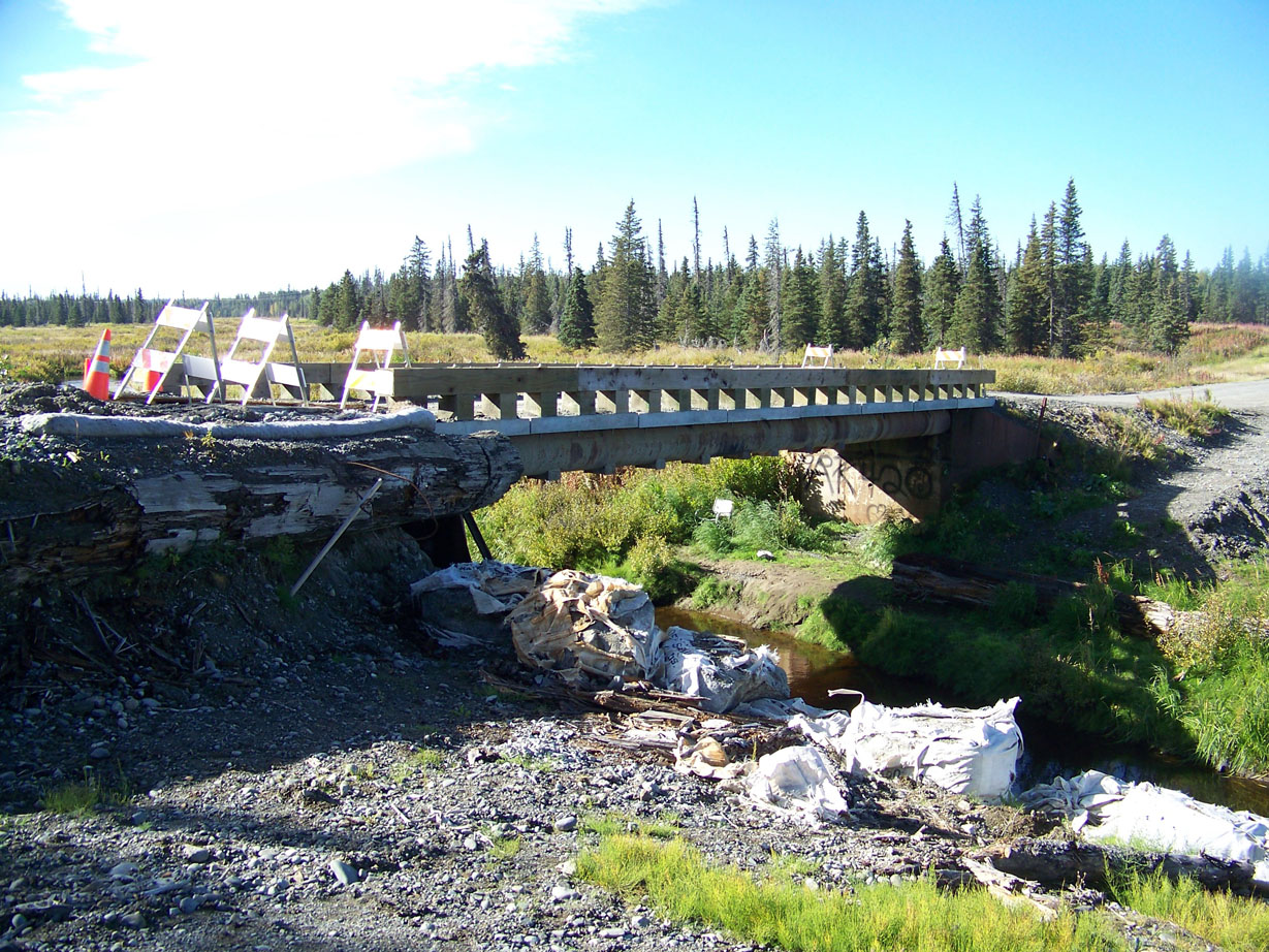 As in previous years, rain has caused damage to abutments of the Tall Tree Avenue bridge across Stariski Creek.-Photo by McKibben Jackinsky, Homer News