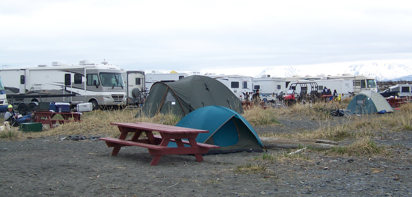 Campers relax at Mariner Park last Saturday for the first busy weekend of the summer tourist season.-Photo by McKibben Jackisnky, Homer News