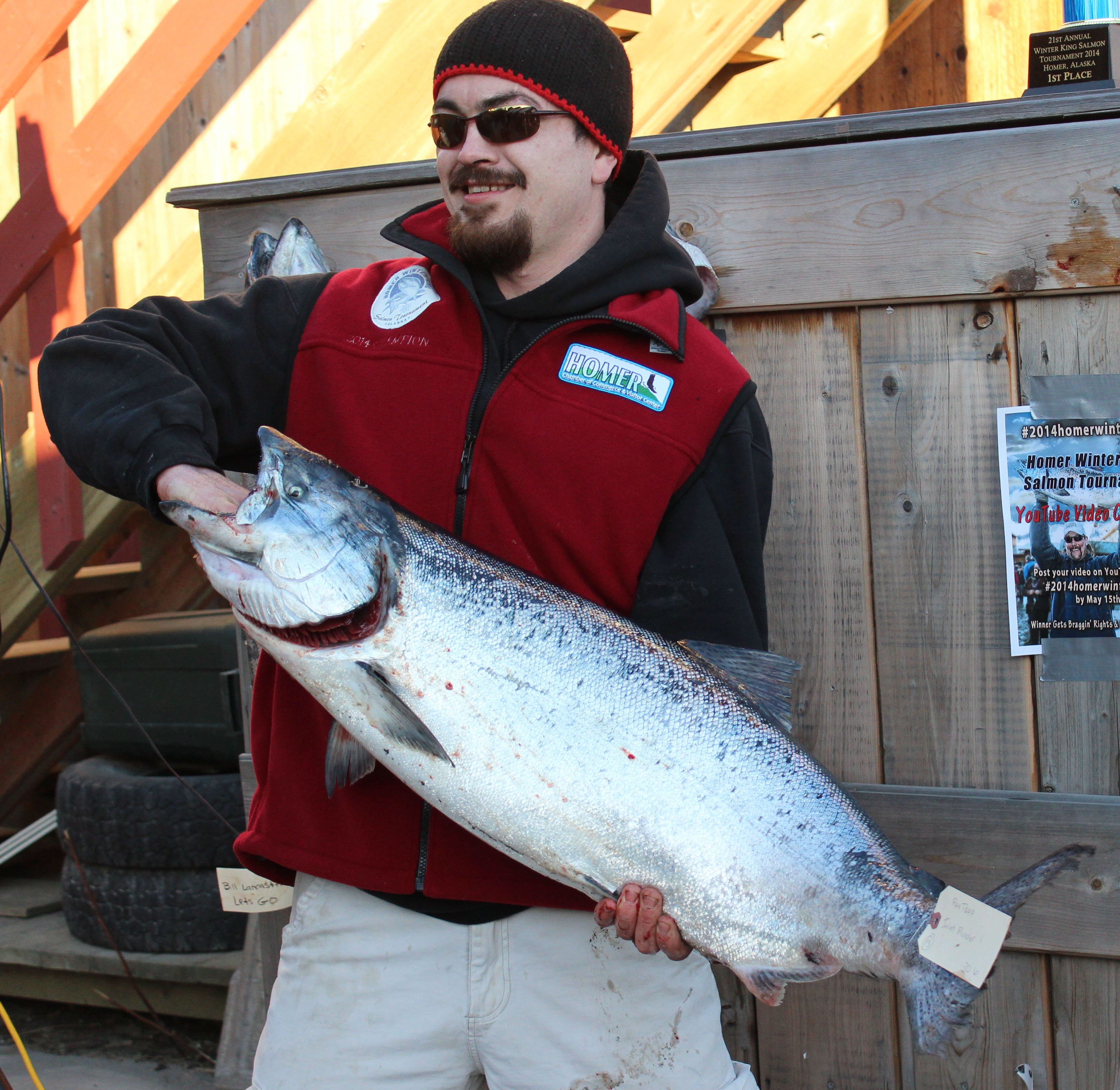 Raymond B. Tepp of Kenai is this year's first-place winner in the Homer Winter King Salmon Tournament with a king salmon weighing 30.60 pounds. Fishing aboard the Inlet Plunder, Tepp's first-place cash prize was $19,026.-Photo by McKibben Jackinsky, Homer News