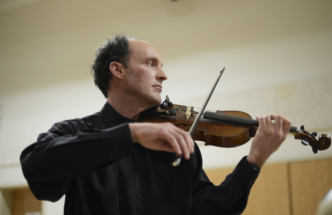 Homer resident Daniel Perry, who plays for the Anchorage Symphony Orchestra, performs during a CD release concert on Sunday, Dec. 20, 2015 at the Sterling Community Center.
