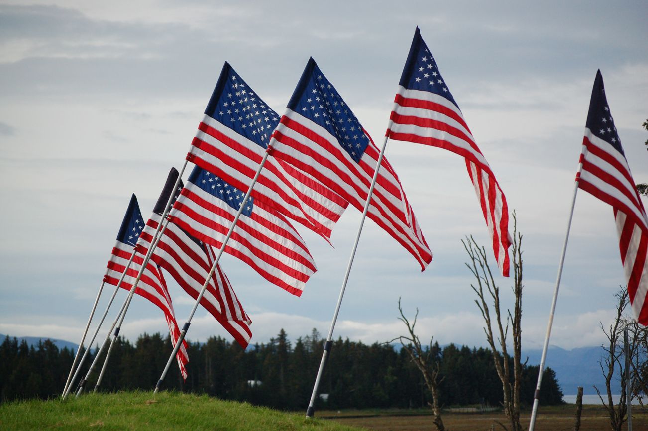 The Homer Downtown Rotary Club placed United States flags on the city park at Lake Street and the Sterling Highway to commemorate the events of Sept. 11. -Photo by Michael Armstrong, Homer News