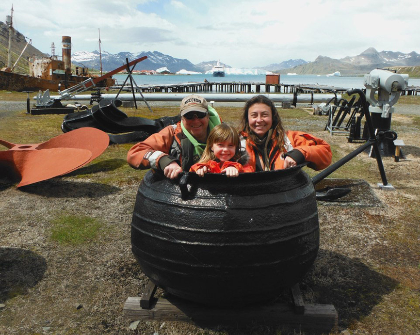 Carmen, Conrad and Eryn Field squeeze into a seal oil trypot in January at South Georgia Museum in the abandoned Grytviken Whaling Station on South Georgia Island, Antarctica. -All images provided and taken by Carmen or Conrad Fields