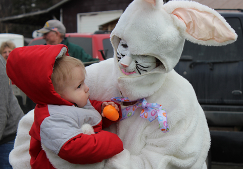 Jaxton Doughty, 1, and the Easter Bunny share a quiet moment.-McKibben Jackinsky
