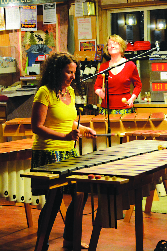 Winn Levitt, front, and Beth Graber, back, play marimba during last year’s Marimba Madness. Their group, Tamba Hadzi, is one of four groups playing starting at 6 p.m. Saturday at the Homer Elks Lodge.-Photo by Michael Armstrong, Homer News