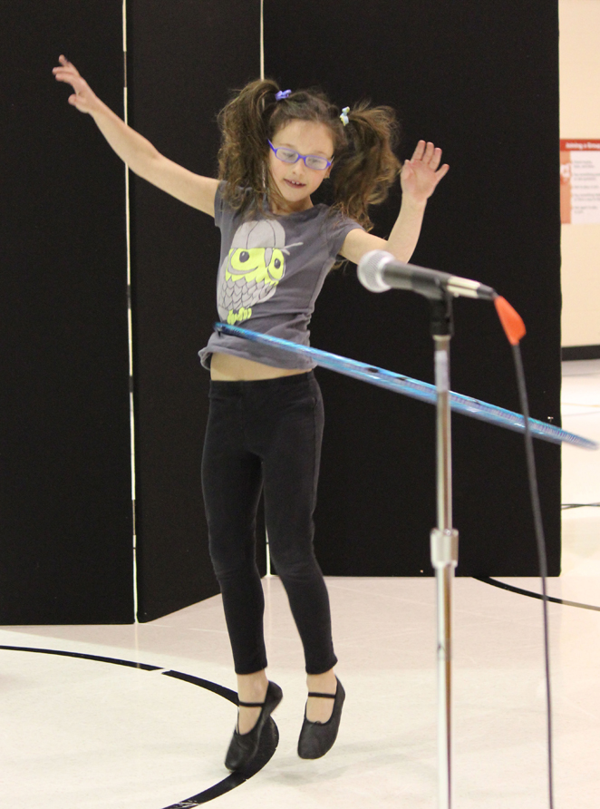 Ireland Styvar performs her “Hula Hoop Magic” routine.-Photo by McKibben Jackinsky, Homer News