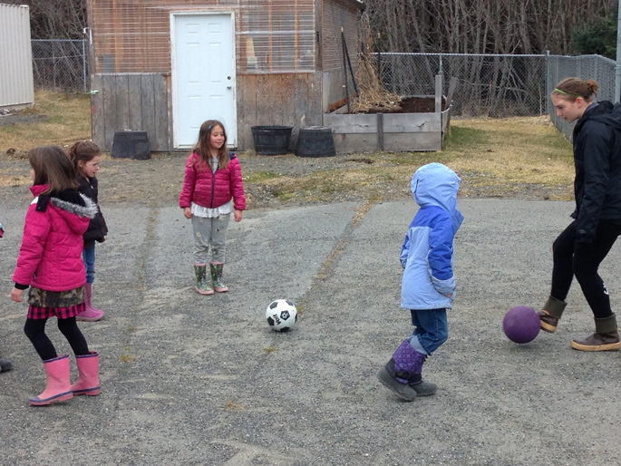 Sam Draves of Homer High School plays soccer with Iris O’Laire and Charity Rainwater. -Photo provided