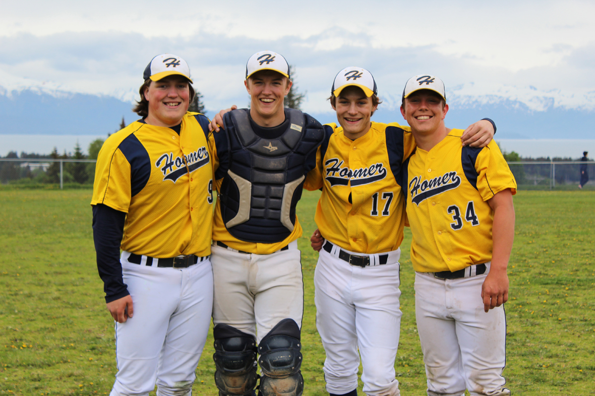 Seniors James Webber, Greg Smith, Kyle Johnson and Michael Swoboda played their final home game as Mariners at Homer High on Thursday, May 19 against Kenai Central. Homer won with a final score of 8-1.-Photo by Anna Frost, Homer News