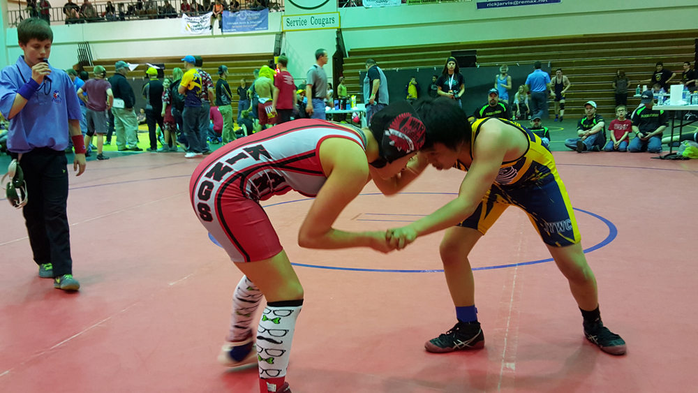 Jadzia Martin wrestles her opponent during a Alaska Battle Cats freestyle tournament match on Saturday, April 16 at Service High. Martin finished first place in the tournament.-Provided by Anchor Kings
