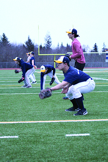 Michael Swoboda and Waope Huffman practice catching and throwing during a baseball practice. The team will play their first game of the season against Soldotna High School on Saturday, April 23.-Photo by Anna Frost; Homer News