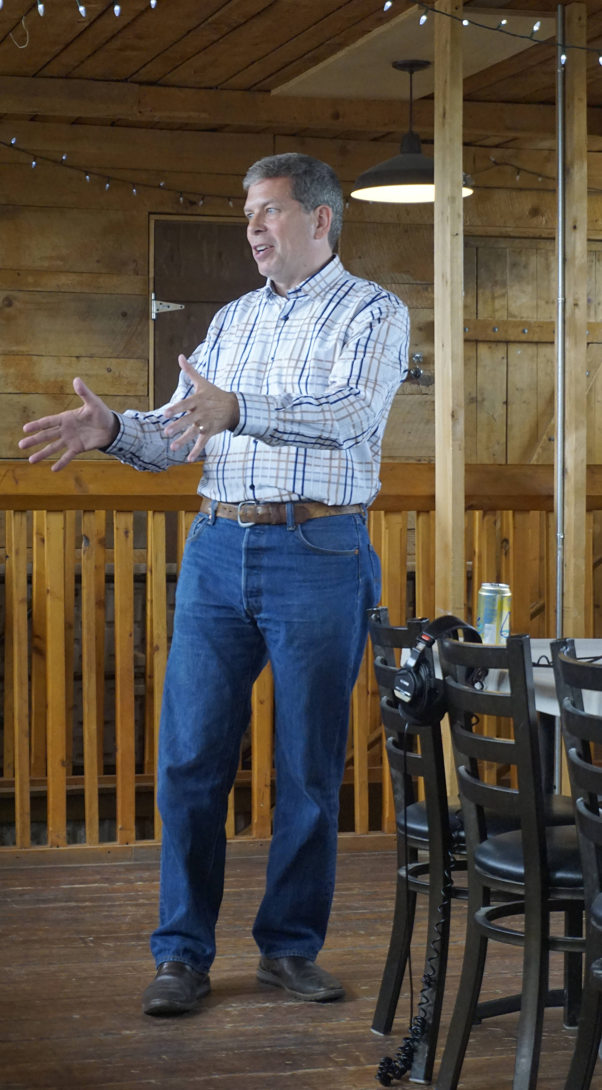 Mark Begich speaks to about 30 people last Thursday, July 26, 2018, at Alice’s Champagne Palace, Homer, Alaska. Begich, a former Anchorage mayor and U.S. Senator, is running for the Democratic Party nomination for governor. (Photo by Michael Armstrong/Homer News)