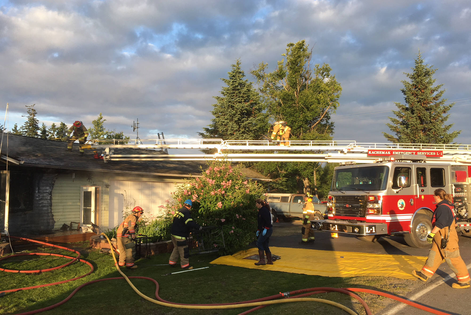 Firefighters responded on July 13, 2018, to a fire at a Danview Avenue home in Homer, Alaska. The fire badly damaged the porch and front of this home, but Homer Volunteer Fire Department and Kachemak Emergency Services firefighters kept the fire from destroying the home. (Photo provided)