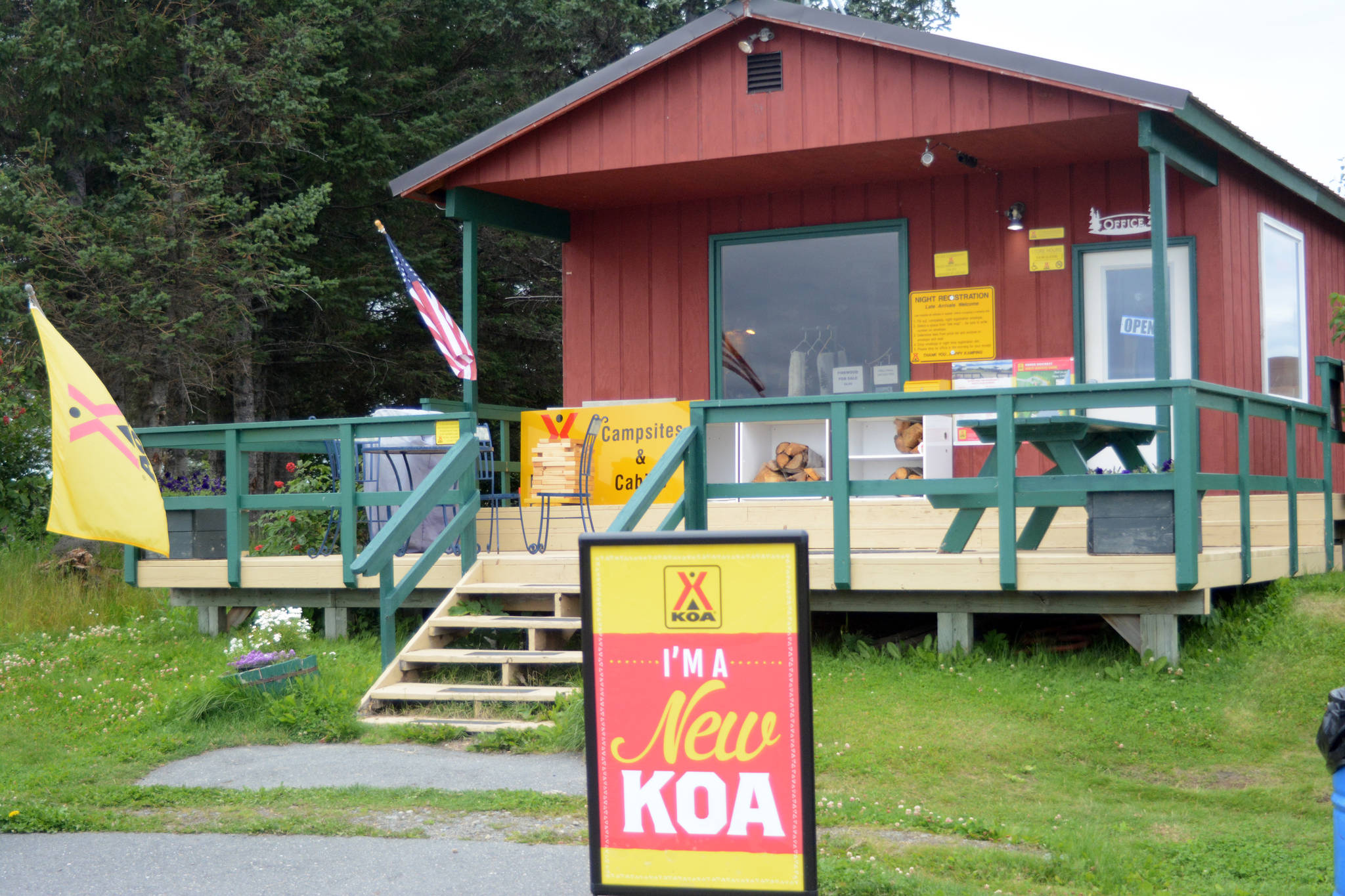 A sign at the Homer/Baycrest KOA Holiday office on Aug, 18, 2018, announces that the park looking out over Kachemak Bay near Baycrest Hill in Homer, Alaska is now a Kampgrounds of America facility. KOA added the business to its network this summer, KOA announced this month in a press release. (Photo by Michael Armstrong/Homer News)