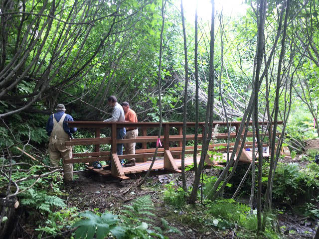 Volunteers work on a section of new trail earlier this year at Karen Hornaday Park in Homer, Alaska. (Photo courtesy Robert Archibald)