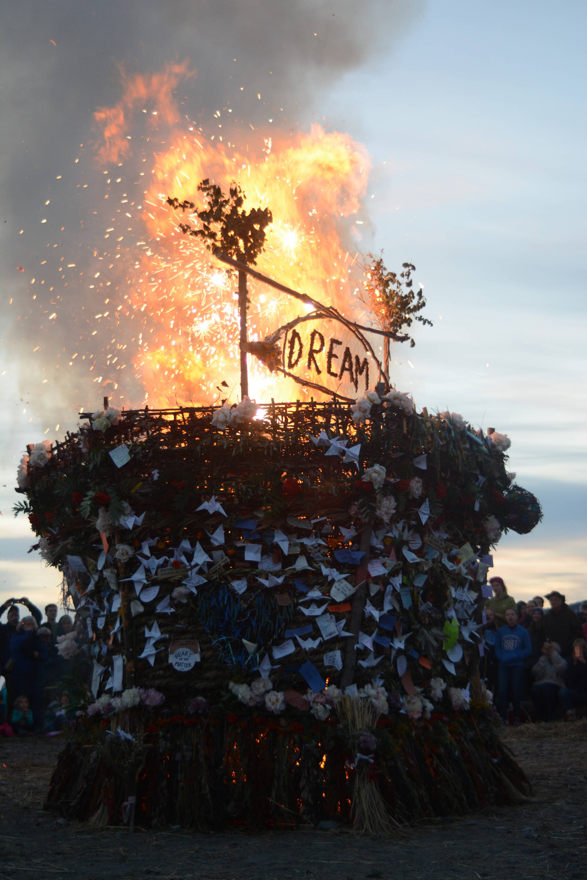 The 2018 Burning Basket, Dream, catches fire on Sept. 9 at Mariner Park, Homer, Alaska. (Photo by Michael Armstrong/Homer News)