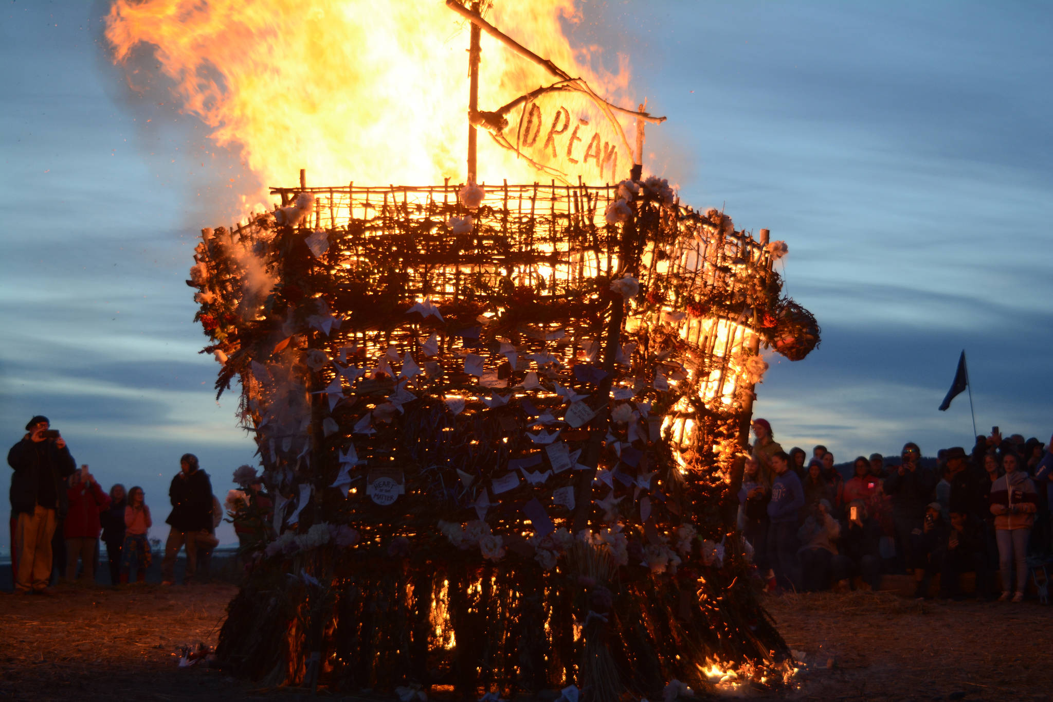 The 2018 Burning Basket, Dream, catches fire on Sept. 9, 2018 at Mariner Park in Homer, Alaska. (Photo by Michael Armstrong/Homer News)