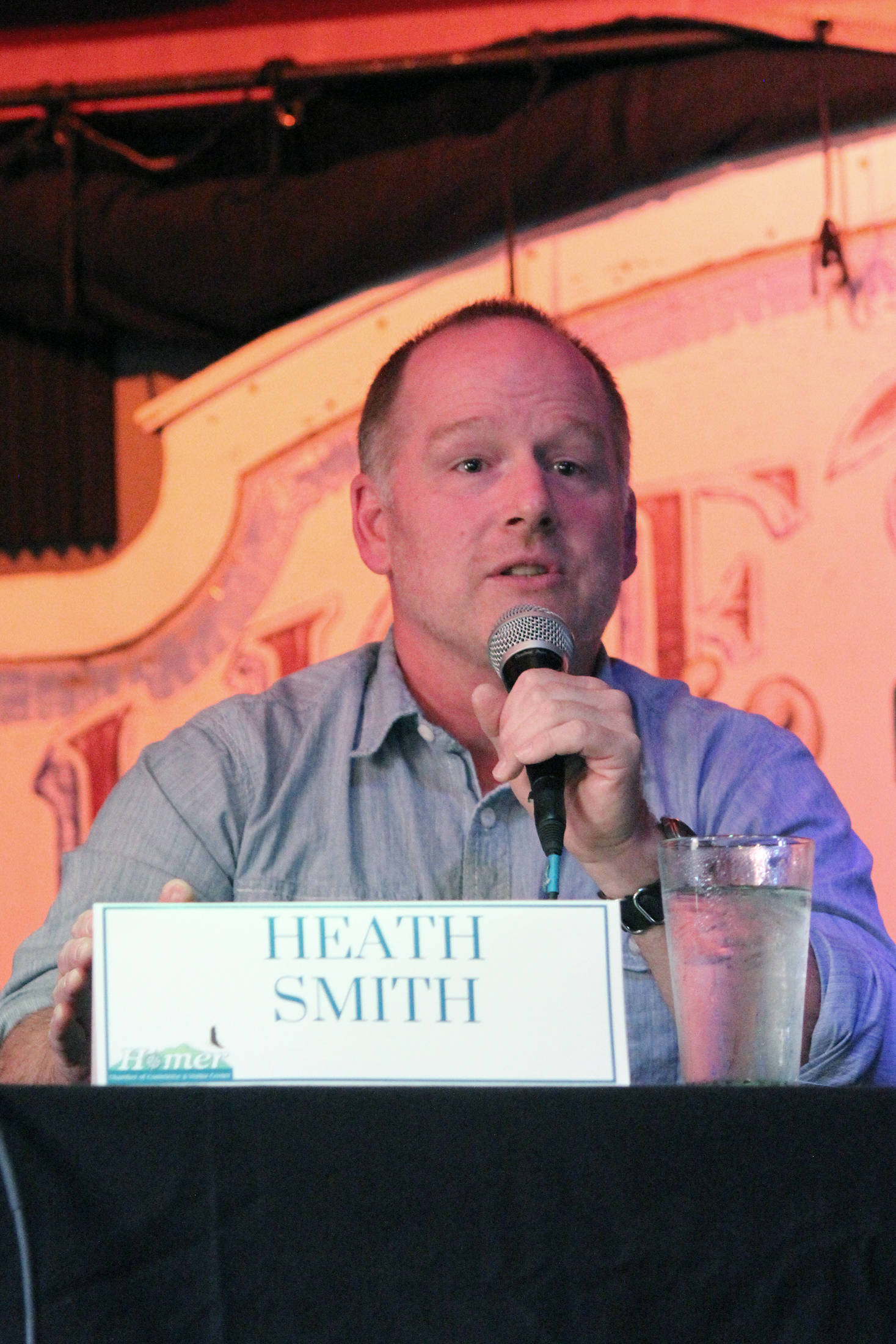 Homer City Council member Heath Smith answers a question during a candidate forum Tuesday, Sept. 11, 2018 at Alice’s Champagne Palace in Homer, Alaska. Hosted by the Homer Chamber of Commerce, the forum was for city council candidates and mayoral candidates. Smith is running for re-election in an uncontested council race. (Photo by Megan Pacer/Homer News)
