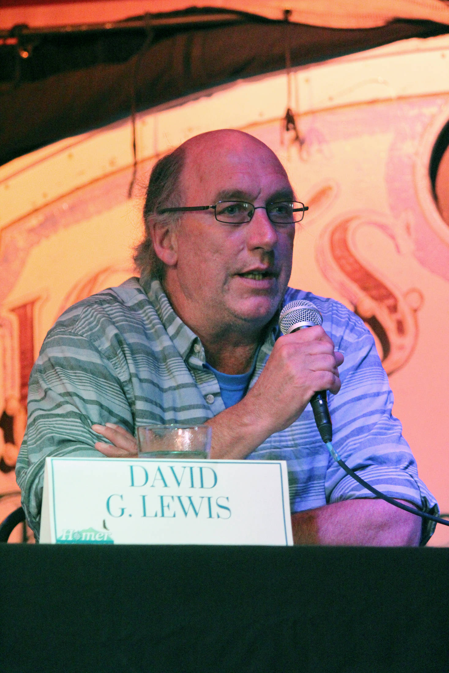 David Lewis, a former Homer City Council member, answers a question during a candidate forum Tuesday. Sept. 11, 2018 at Alice’s Champagne Palace in Homer, Alaska. Lewis, who is running for Homer mayor, participated in the forum for mayoral and council candidates hosted by the Homer Chamber of Commerce. (Photo by Megan Pacer/Homer News)