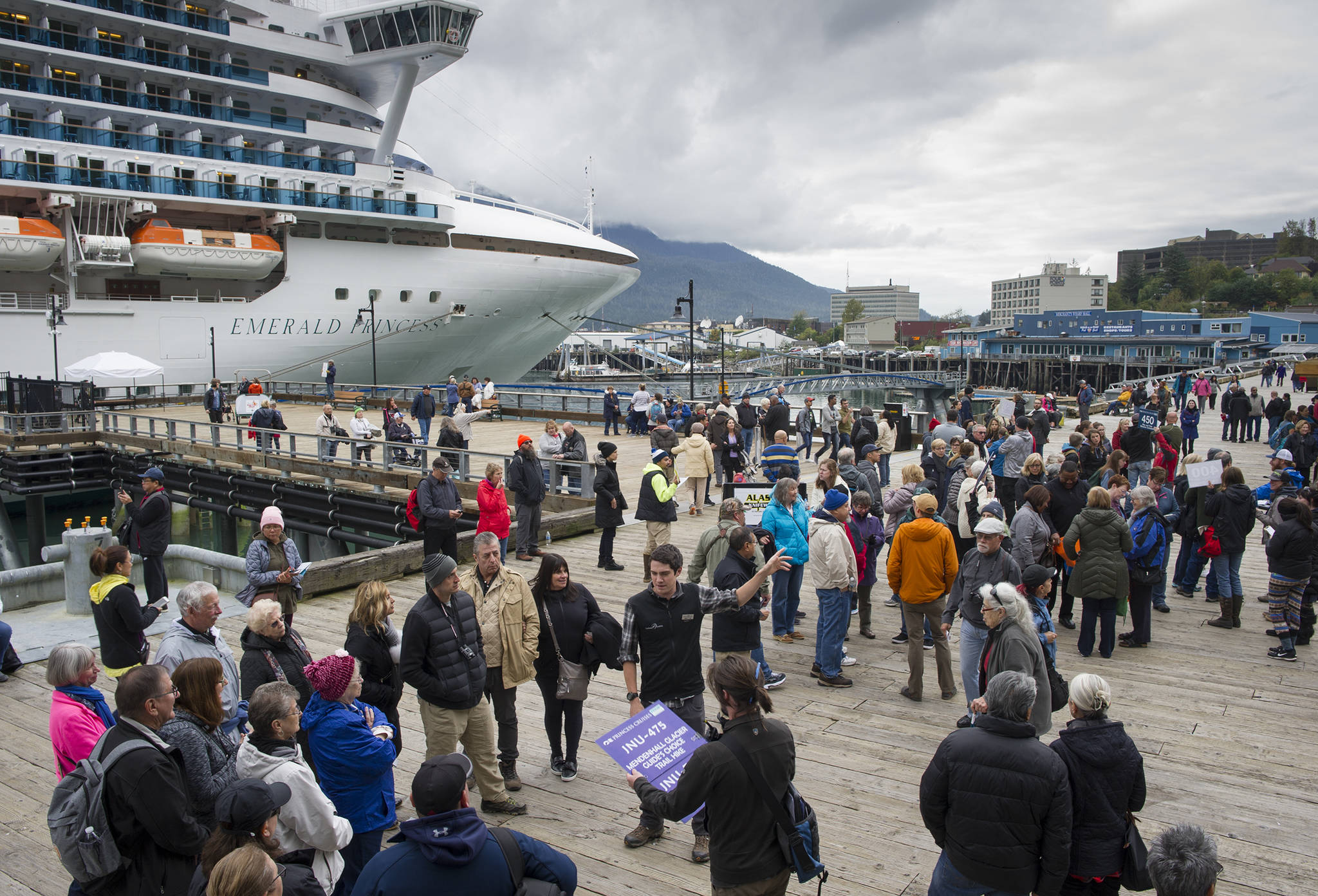 <span class="neFMT neFMT_PhotoCredit">Michael Penn/Juneau Empire</span>                                In this file photo, cruise ship visitors gather for their tours on the Seawalk on Wednesday, Sept. 13, 2017.