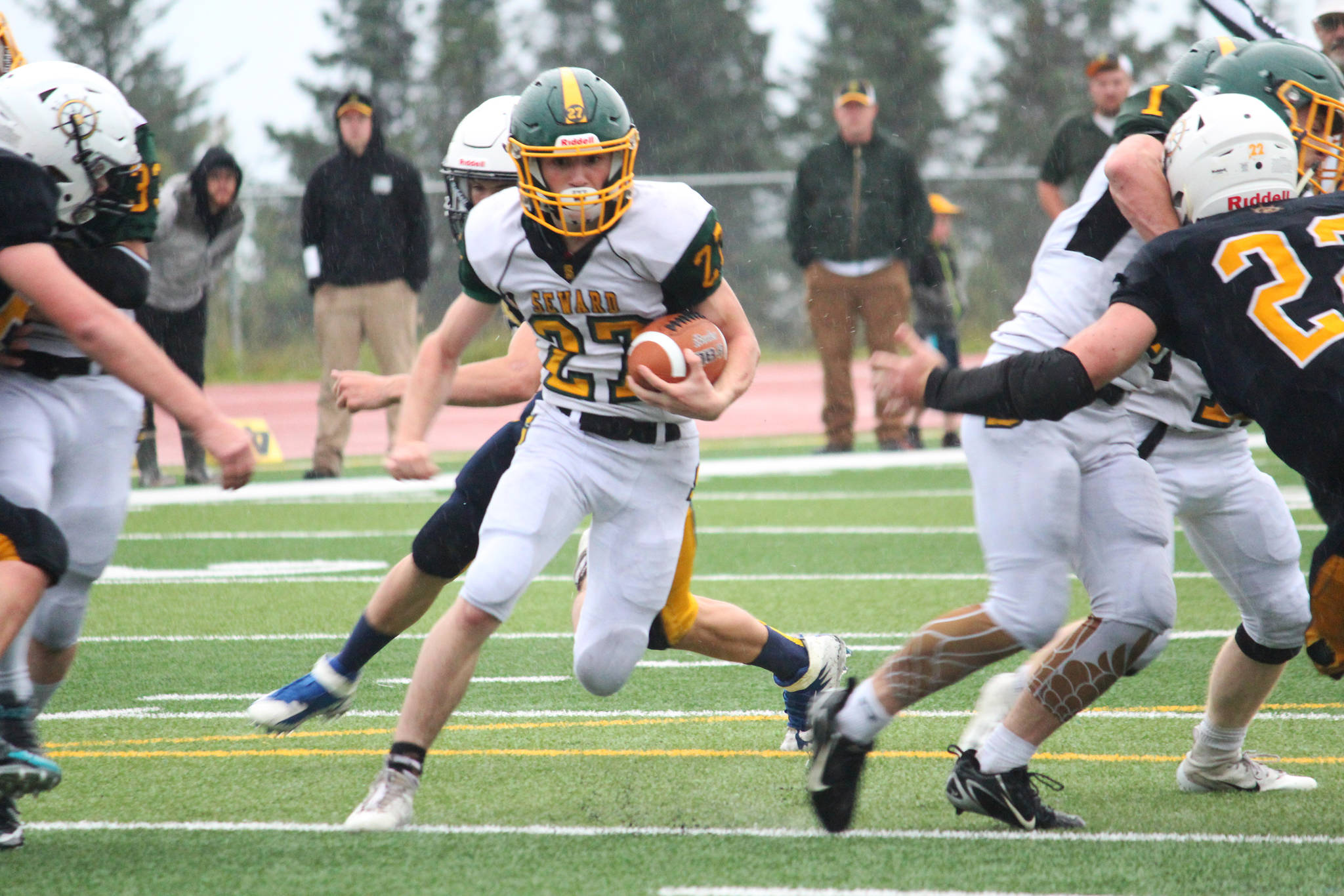 Seward’s Shane Sullivan finds an opening to run the ball through during Homer High School’s homecoming game Friday, Sept. 21, 2018 at the high school in Homer, Alaska. The Mariners beat the Seahawks 21-20. (Photo by Megan Pacer/Homer News)