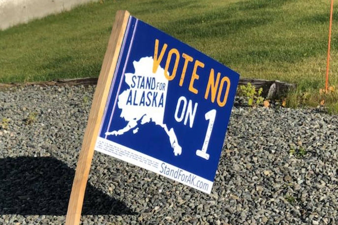 A sign opposing the Stand for Salmon ballot initiative in photographed on Tuesday in Kenai. (Photo by Victoria Petersen/Peninsula Clarion)