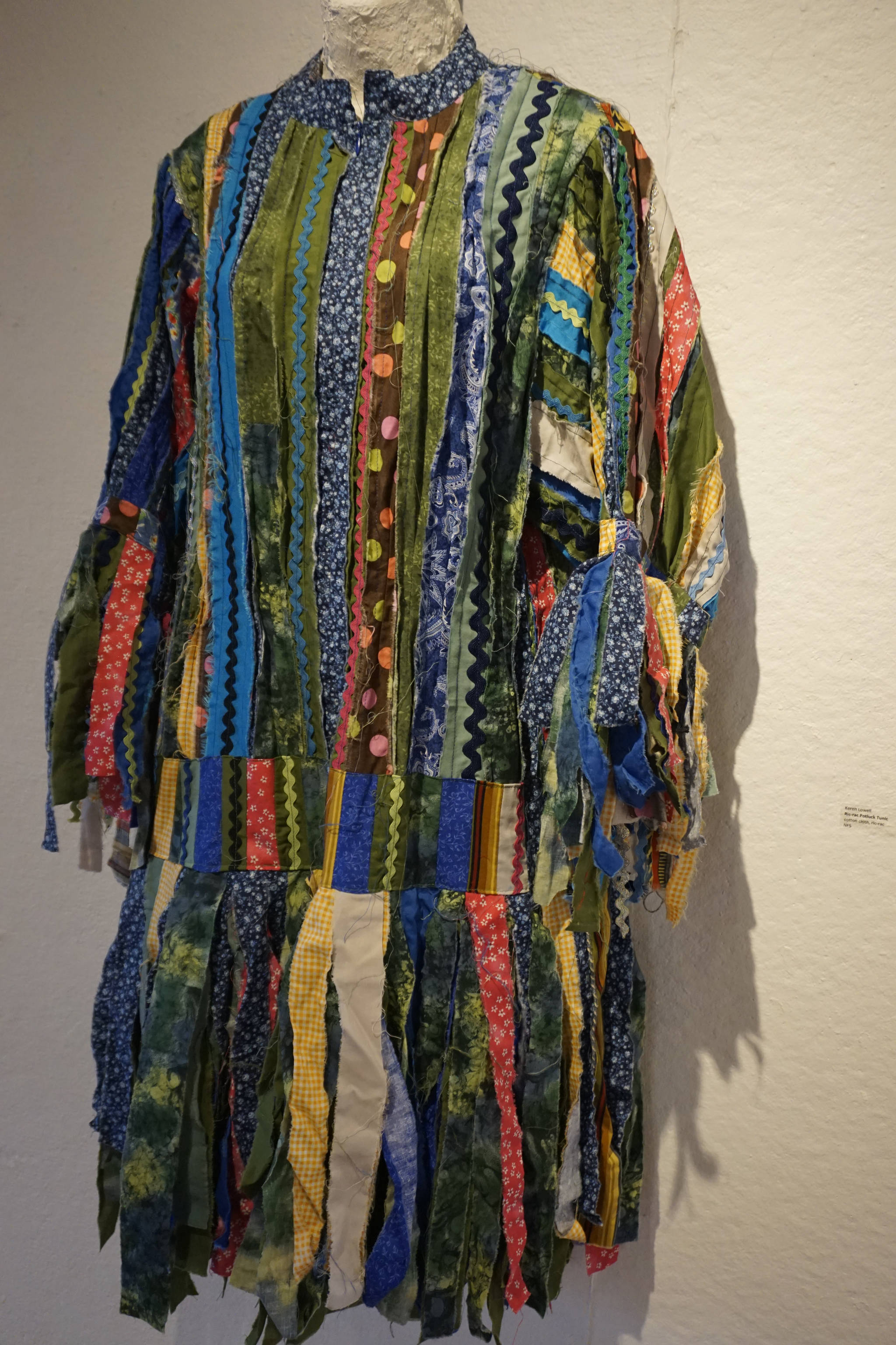 Keren Lowell’s “Ric-Rac Potluck Tunic,” part of her show at Bunnell Street Arts Center as seen at the First Friday, Oct. 6, 2018, opening in Homer, Alaska. (Photo by Michael Armstrong/Homer News)