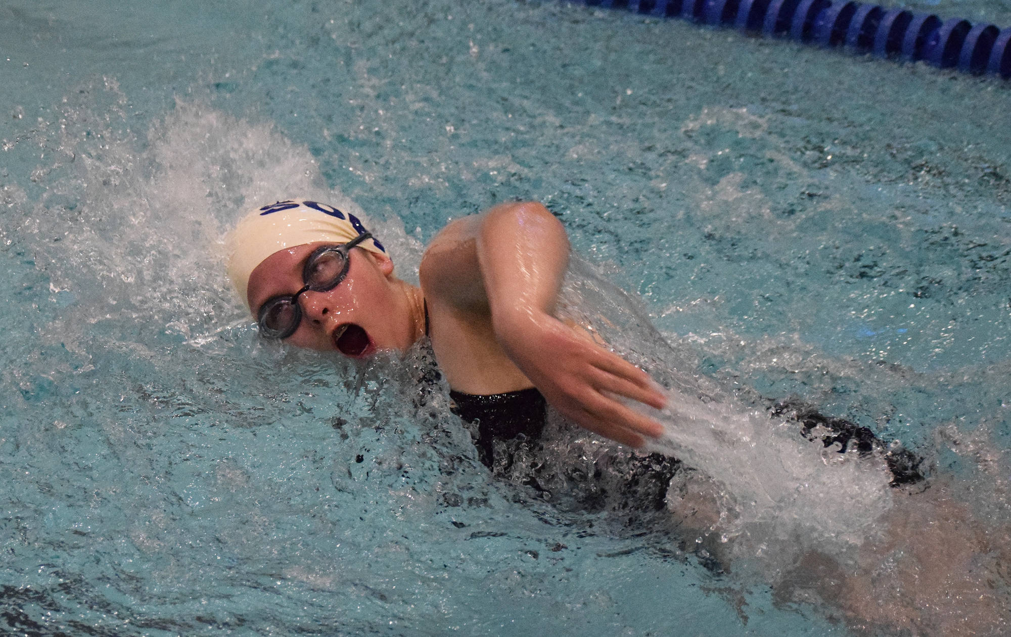 Soldotna’s Ester Frederickson competes in the girls 100-yard freestyle race at the SoHi dual meet Friday, Oct. 12, 2018 at Soldotna High School in Soldotna, Alaska. (Photo by Joey Klecka/Peninsula Clarion)