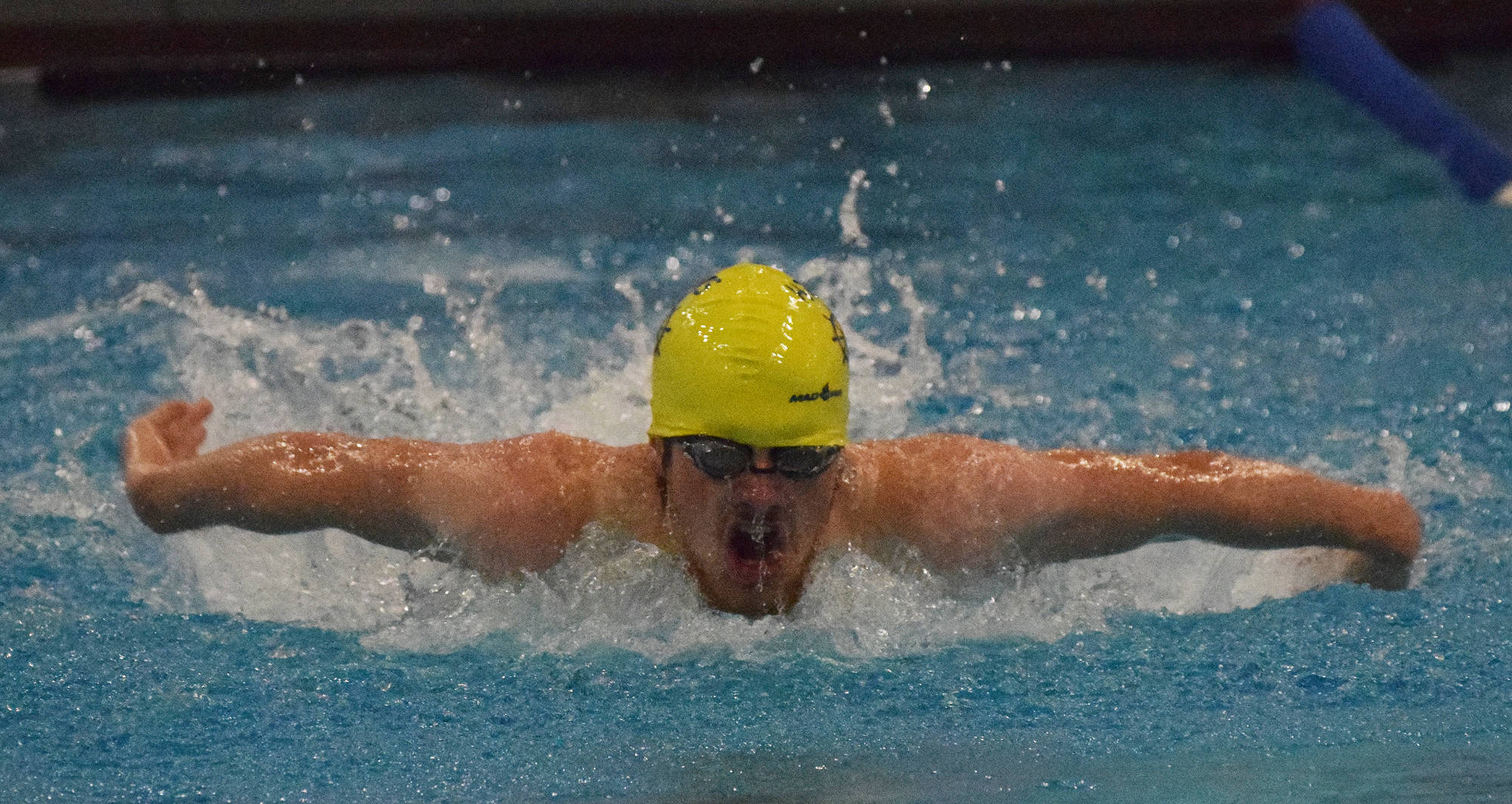 Homer’s Teddy Handley races in the boys 100-yard butterfly event at the SoHi dual meet Friday, Oct. 12, 2018 at Soldotna High School in Soldotna, Alaska. (Photo by Joey Klecka/Peninsula Clarion)