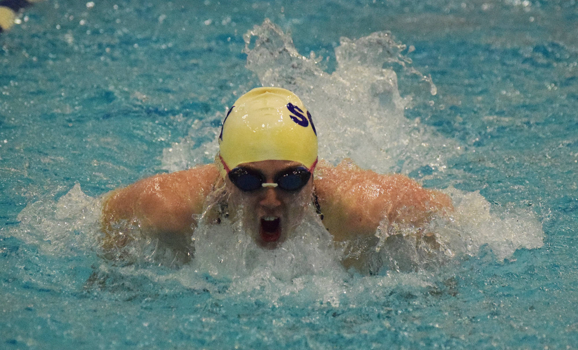 Soldotna’s Darby McMillan races in the girls 100-yard butterfly at the SoHi dual meet Friday, Oct. 12, 2018 at Soldotna High School in Soldotna, Alaska.