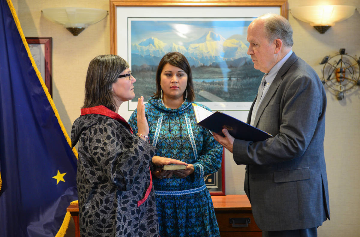 Valerie Davidson, left, takes the oath of office as Alaska’s lieutenant governor on Tuesday, Oct. 16, 2018 from Gov. Bill Walker in Anchorage. (Office of the Governor | Courtesy photo)