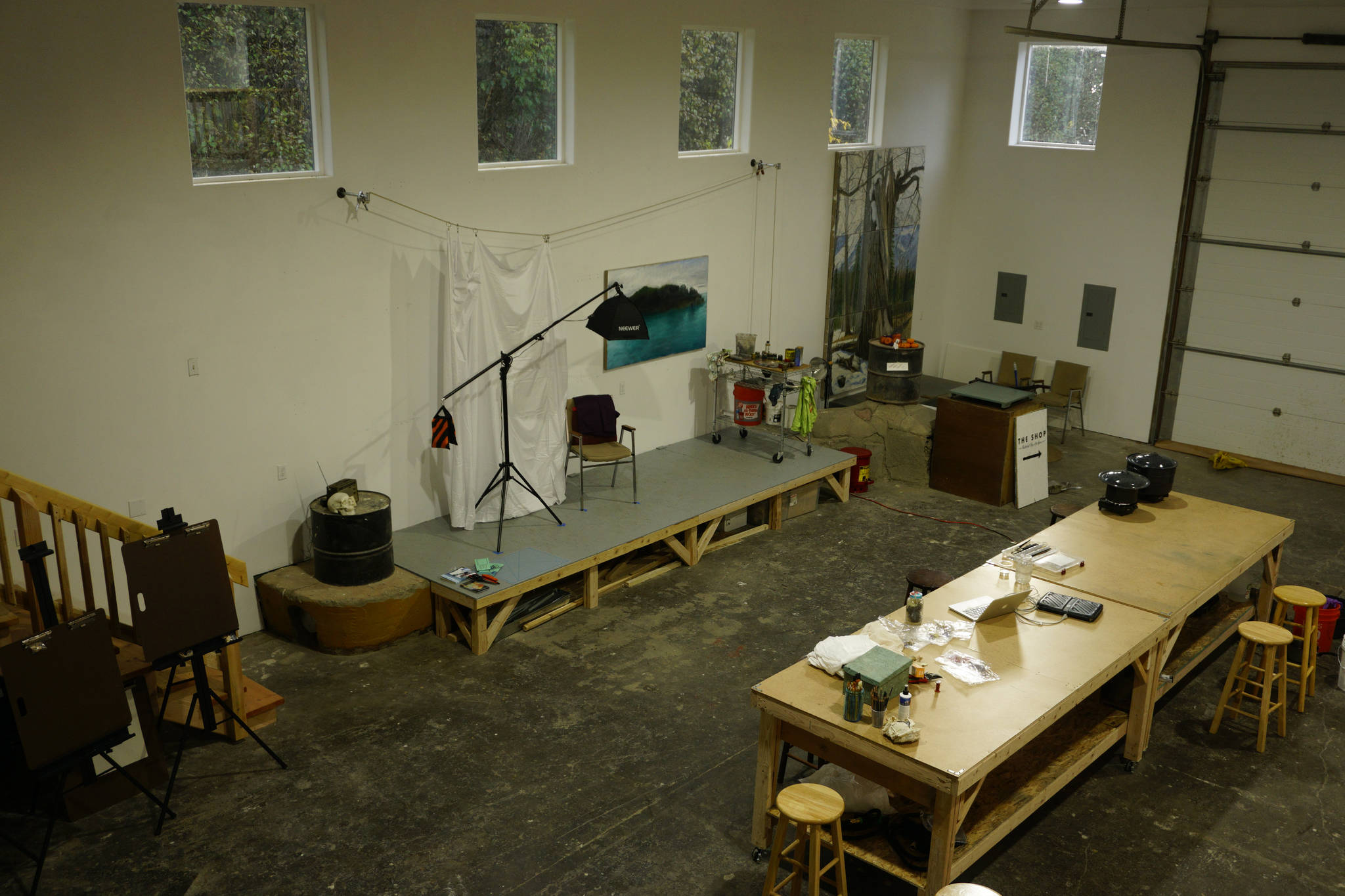 A view from the upper loft of The Shop, shown here Tuesday, Oct. 16, 2018, shows a posing platform and classroom space. Elissa and David Pettibone started the art space in August 2018 in Kachemak City, Alaska. (Photo by MIchael Armstrong/Homer News)