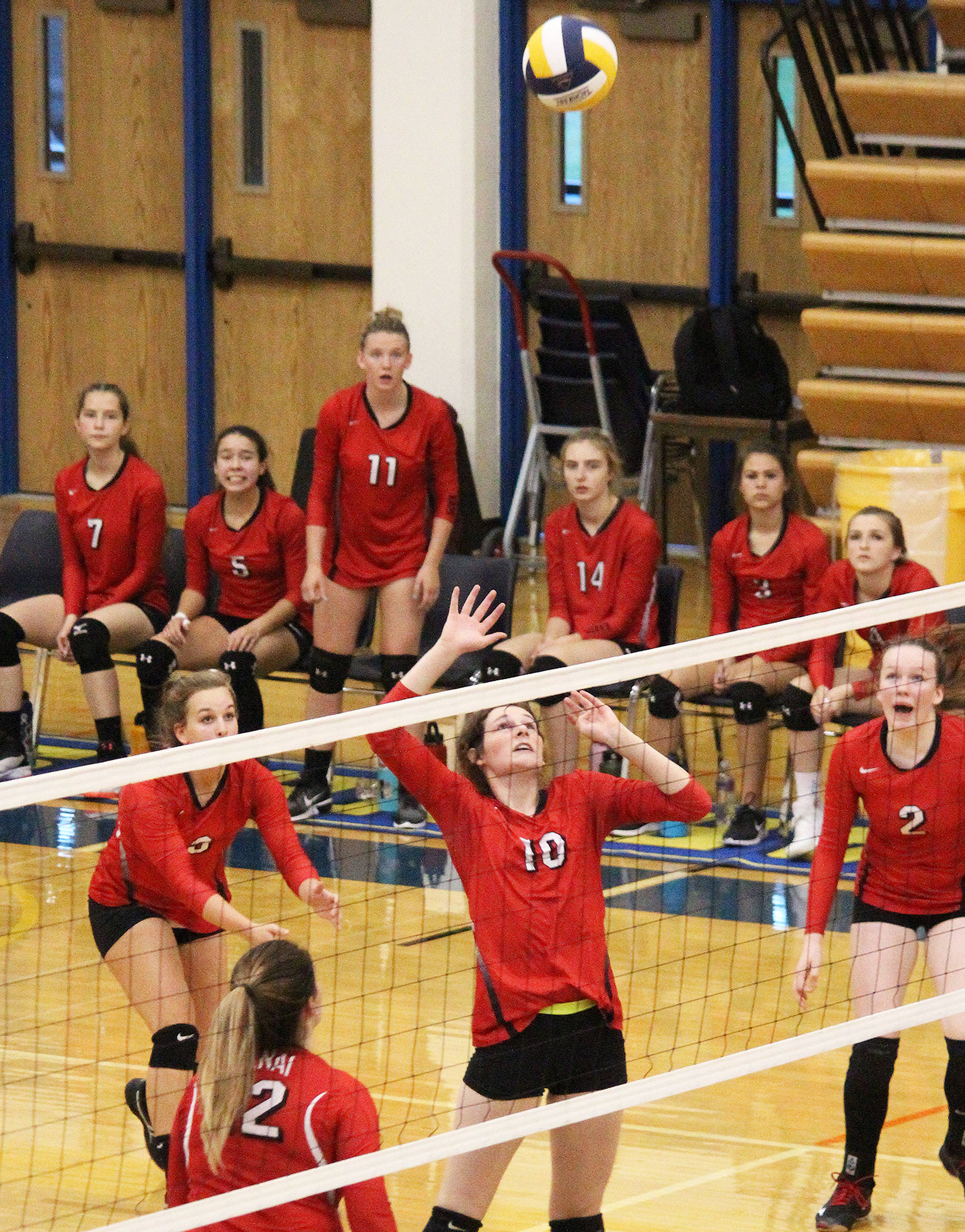 Kenai sophomore Abby Every prepares to spike the ball during a game against Homer High School on Thursday, Sept. 13, 2018 at the school in Homer, Alaska. The Mariners beat the Kardinals three games to one. (Photo by Megan Pacer/Homer News)