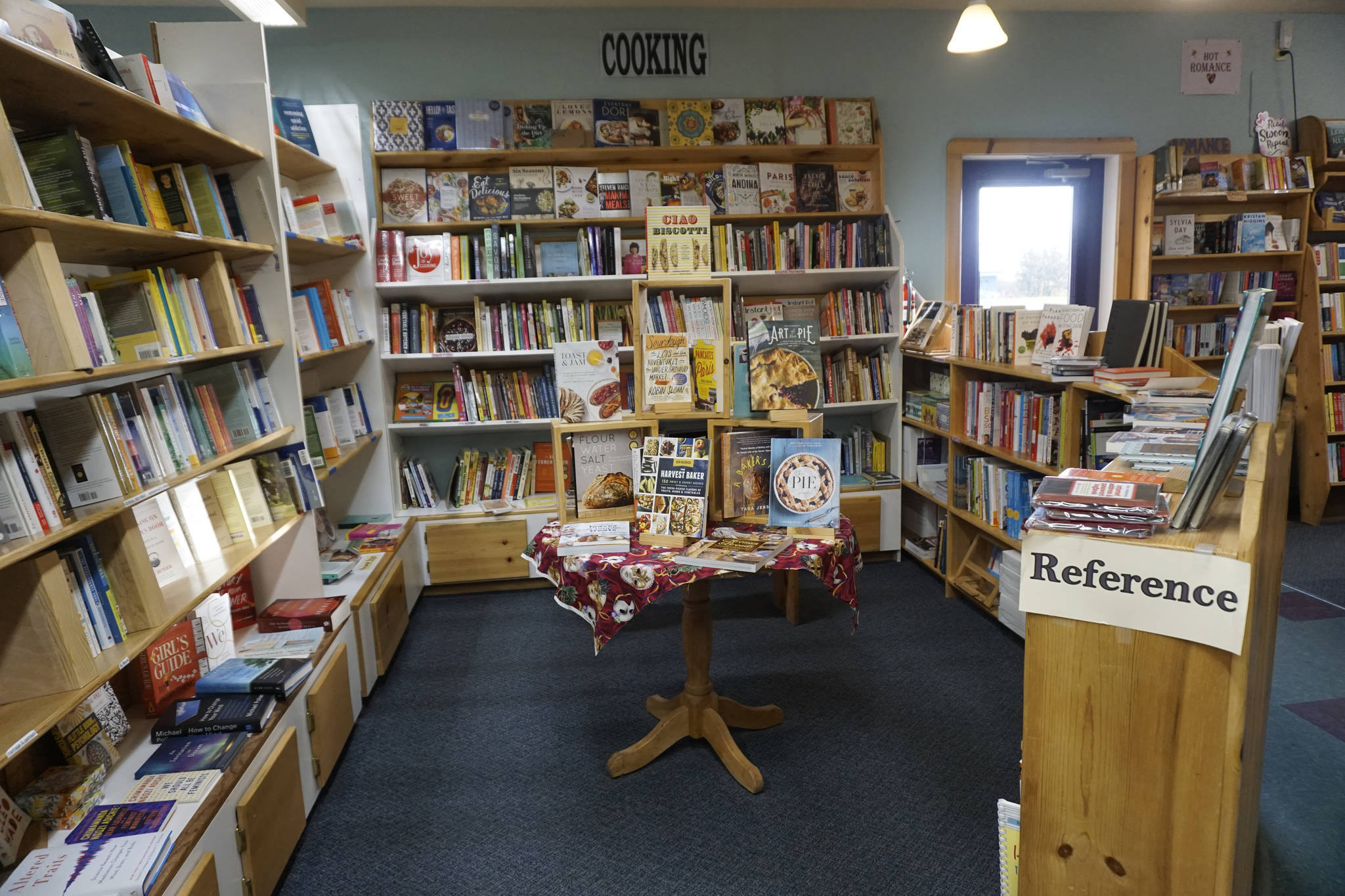 The cooking and reference section at the Homer Bookstore on Oct. 29, 2018, in Homer, Alaska. (Photo by Michael Armstrong/Homer News)