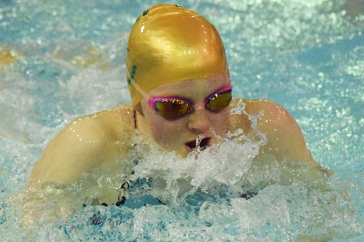 Seward’s Lydia Jacoby races to victory in the girls 100-yard breaststroke final Saturday at the Northern Lights Conference championship swim meet at Homer High School. (Photo by Joey Klecka/Peninsula Clarion)