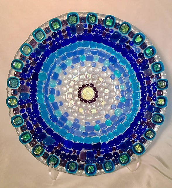 Nancy Wise’s fused glass plate, on display at the Art Shop Gallery in Homer, Alaska. (Photo provided)