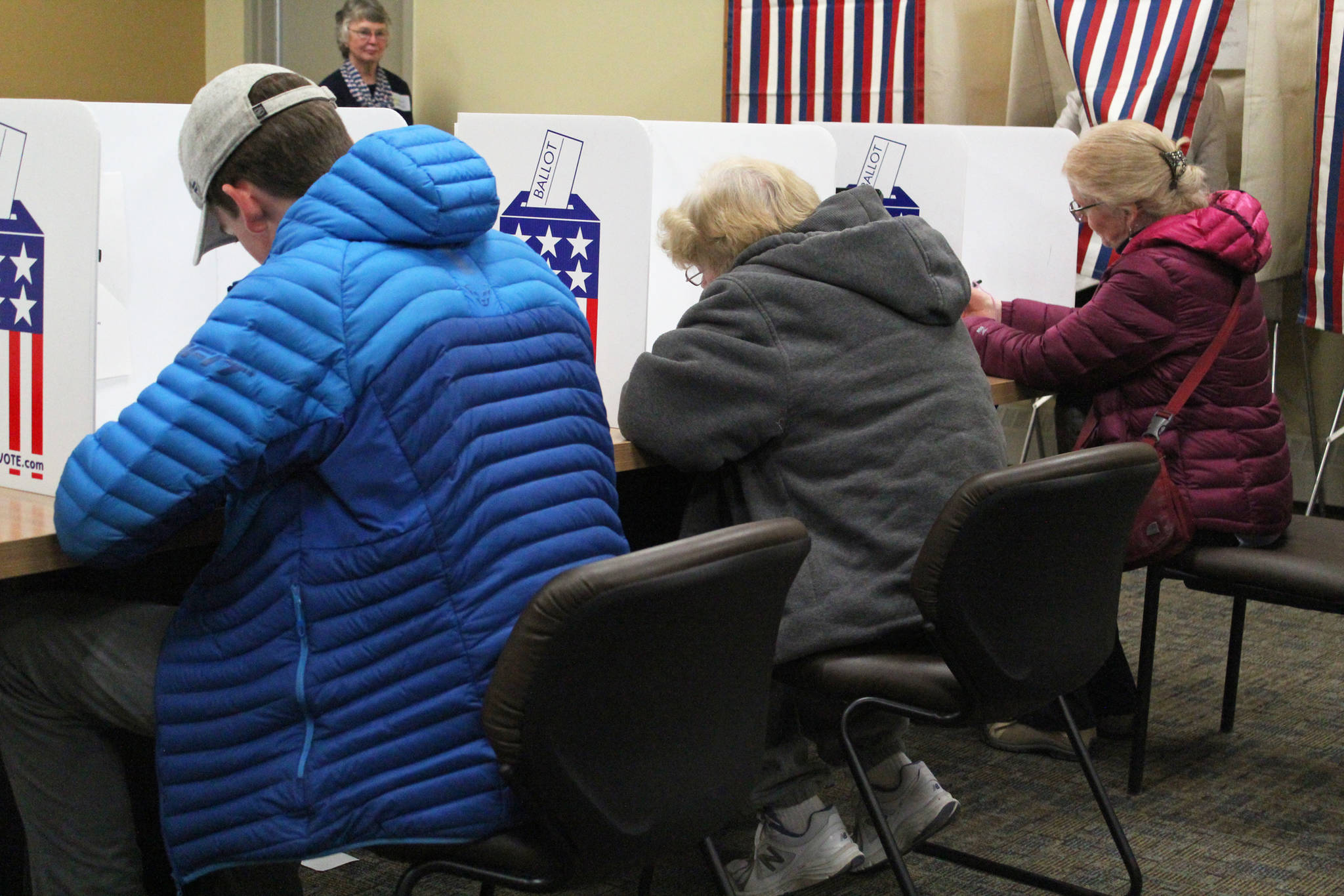 Homer residents cast their votes in the 2018 midterm election Tuesday, Nov. 6, 2018 at Homer City Hall in Homer, Alaska. (Photo by Megan Pacer/Homer News)