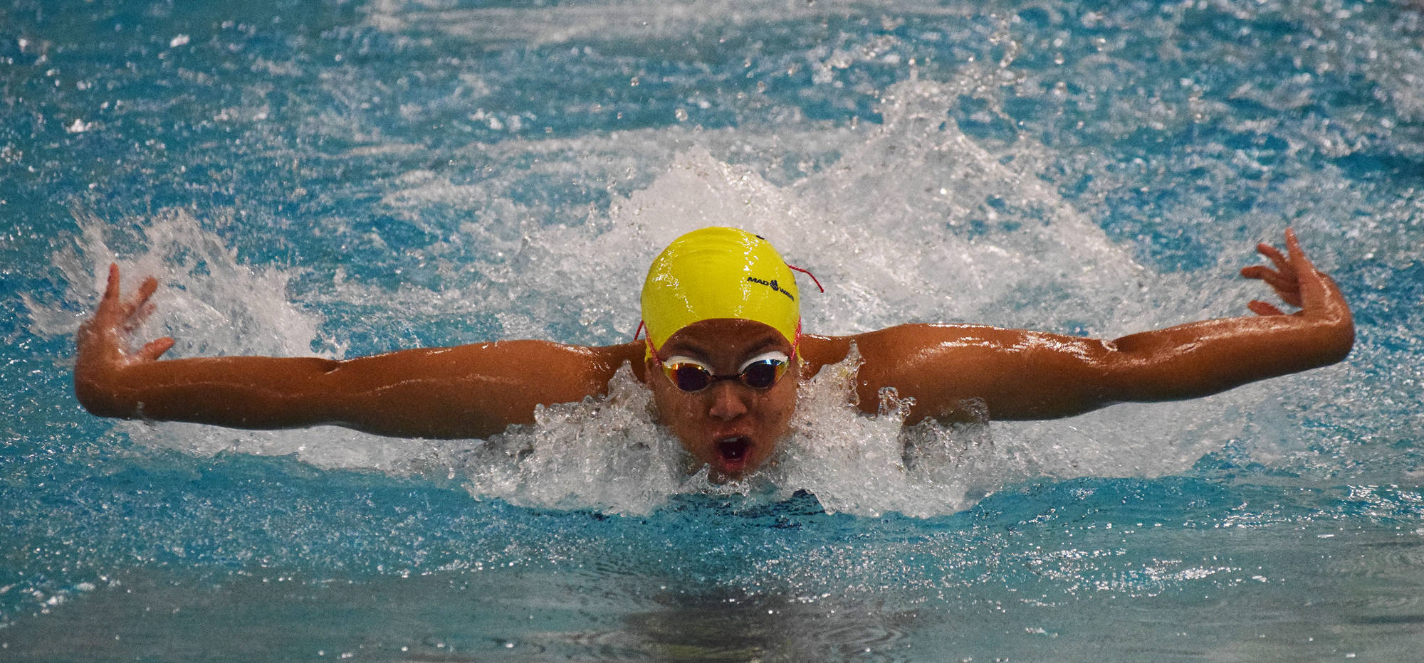 Homer’s Alia Bales races the butterfly leg in the girls 200-yard medley relay Saturday, Nov. 3, 2018 at the ASAA swimming and diving state championships at Bartlett High School in Anchorage, Alaska. (Photo by Joey Klecka/Peninsula Clarion)