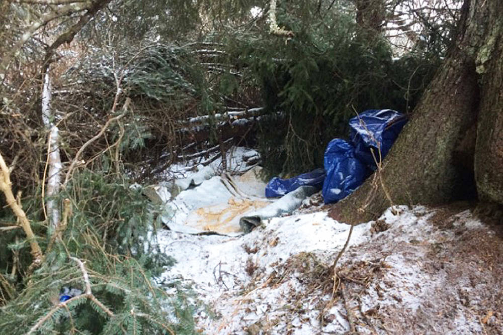 Port Graham resident Ryan Meganack’s makeshift camp, about 400 feet from his mother’s home in the village across Kachemak Bay from Homer, where he was found and arrested in Dec. 2016. (Photo courtesy U.S. Attorney’s Office, District of Alaska)