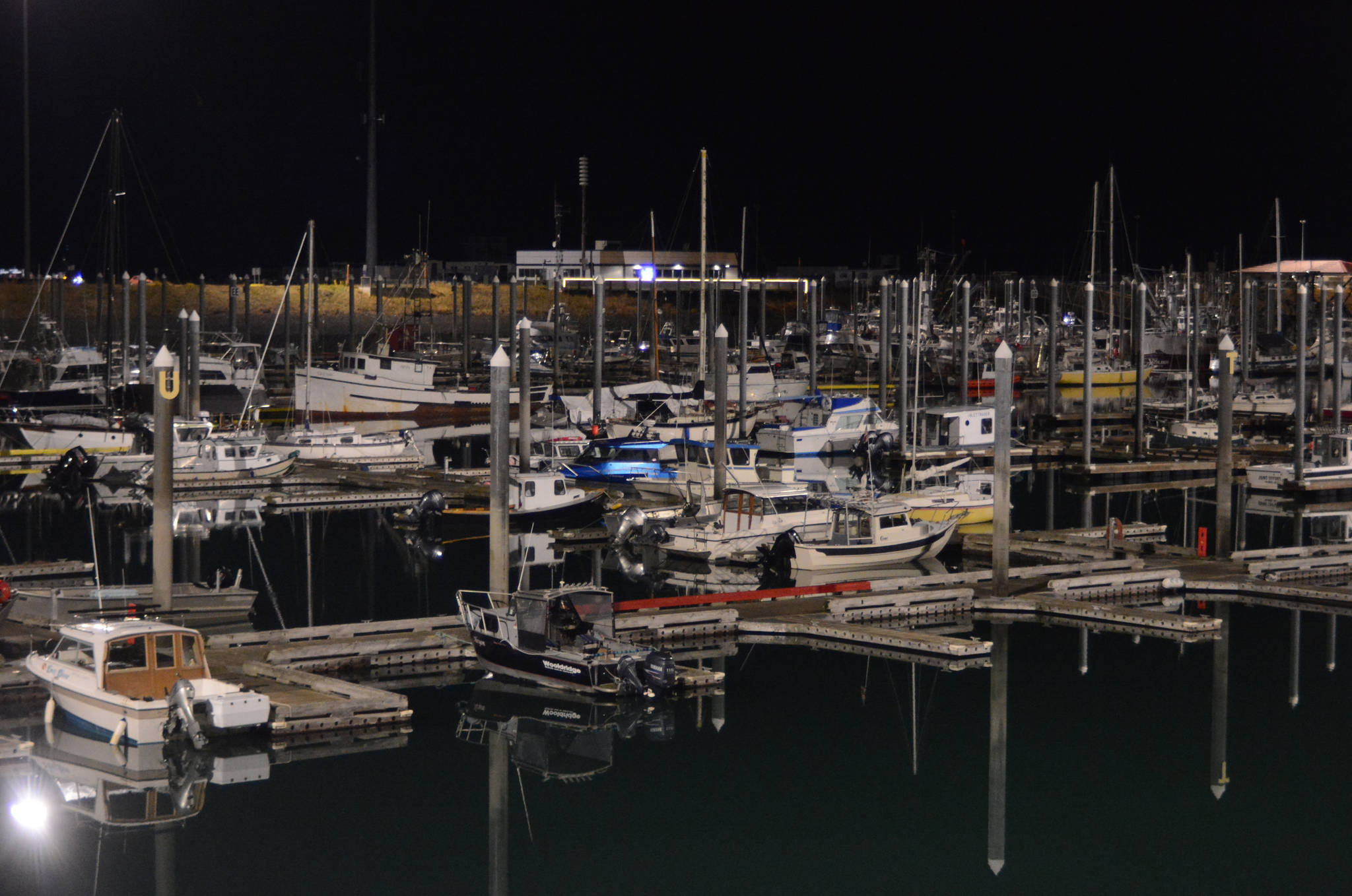 Boats are moored in the Homer Harbor on a calm Saturday night on Nov. 17, 2018, in Homer, Alaska. (Photo by Michael Armstrong/Homer News)