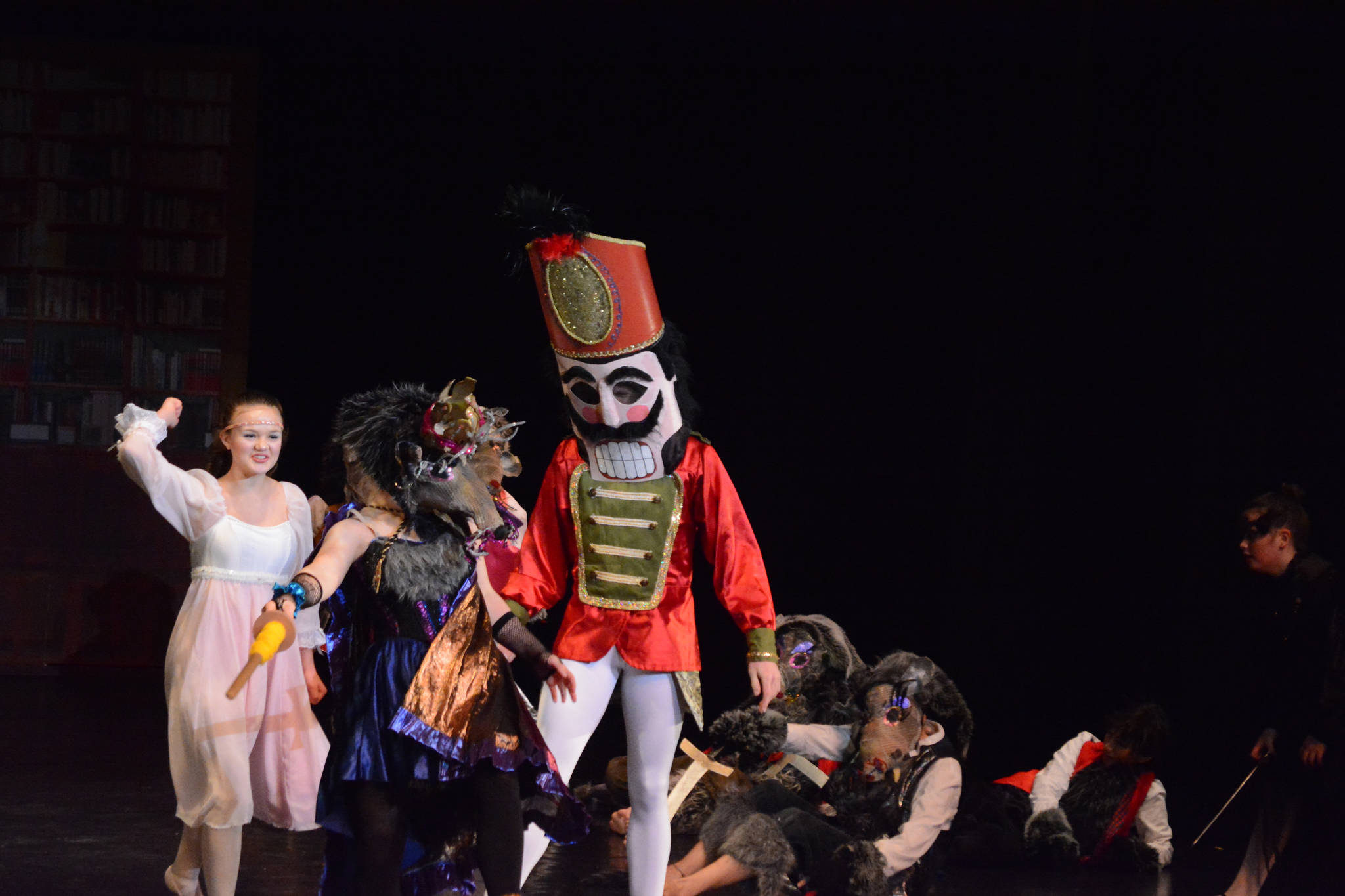 Daisy Kettle as the Queen Rat battles the Liam James as the Battler Nutcracker in a scene from a rehearsal of the Homer production of the Nutcracker Ballet on Nov. 25, 2018, at the Mariner Theatre in Homer, Alaska. (Photo by Michael Armstrong/Homer News)