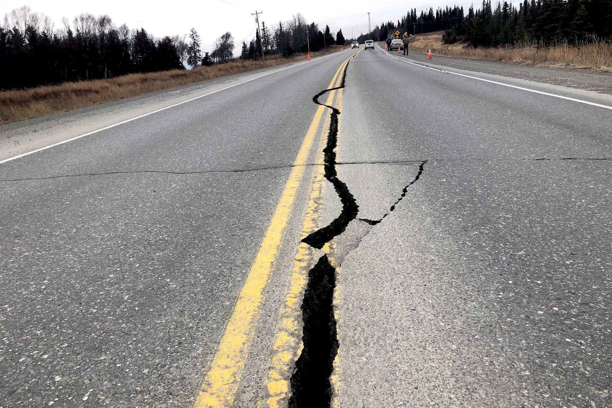 A long crack stretches along a length of road in Nikiski, Alaska on Friday, Nov. 30, 2018 due to a 7 magnitude earthquake that shook the Kenai Peninsula, along with the Anchorage, Wasilla and Palmer areas. (Photo by Victoria Petersen/Peninsula Clarion)