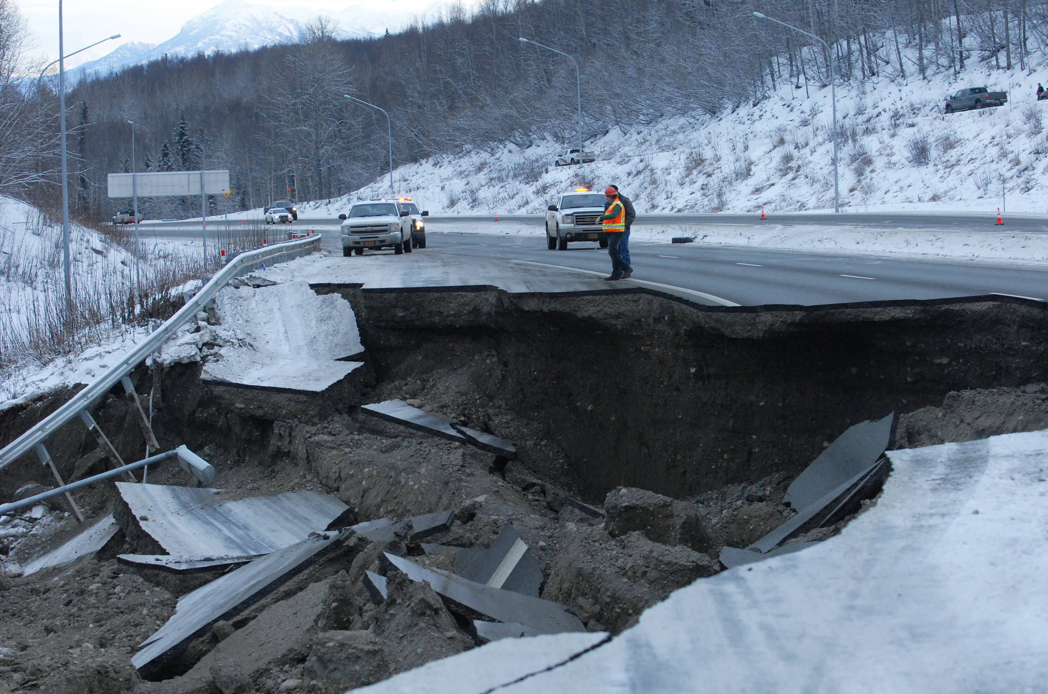 A section of the Glenn Highway damaged by Friday’s earthquake in Alaska. The road fell away between Eklutna and Mirror Lake. A Department of Transportation project manager said the damage will take several days to repair, but didn’t have an exact timeline. (Photo by Matt Tunseth/ADN)