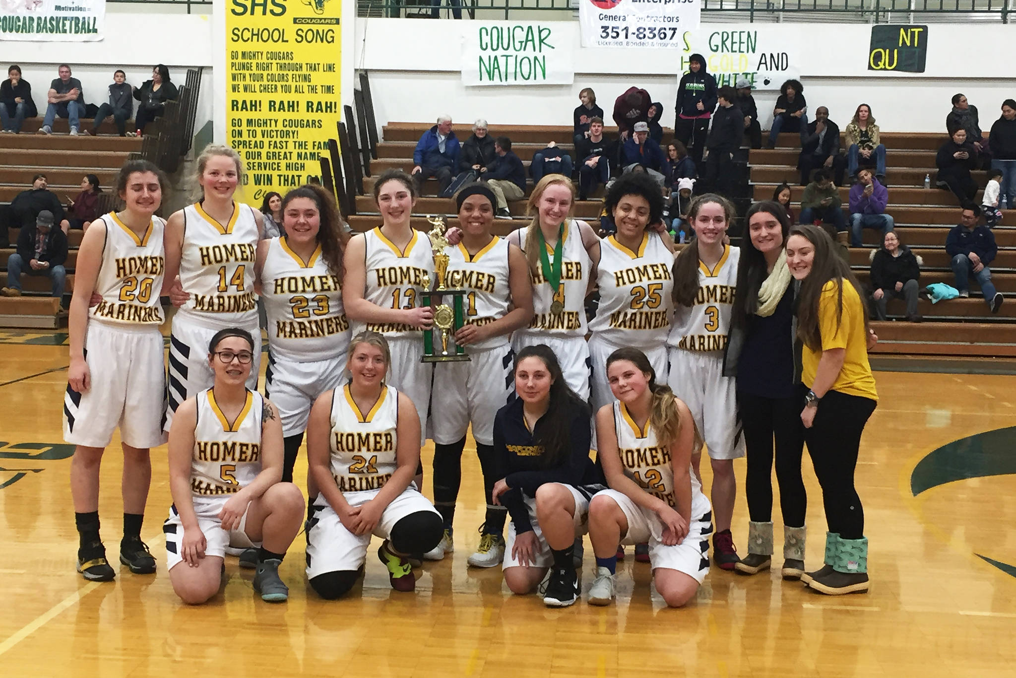 <span class="neFMT neFMT_PhotoCredit">Photo by Wendy Todd</span>                                The Homer girls basketball team holds their first place trophy at the Service Cougar Tip Off tournament, held Friday and Saturday, Dec. 14-15, 2018 in Anchorage, Alaska. Top row from left to right: Marina Carroll, Cora Parish, Bri Hetrick, Rylyn Todd, Alia bales, Kelli Bishop, Lexi Dawson, Laura Inama, Manager Brooke Knotte, and Manager Katie Clark. Bottom row: Shelly Johnson, Alexis Kreger, Hannah Hatfield, and Rylee Doughty.