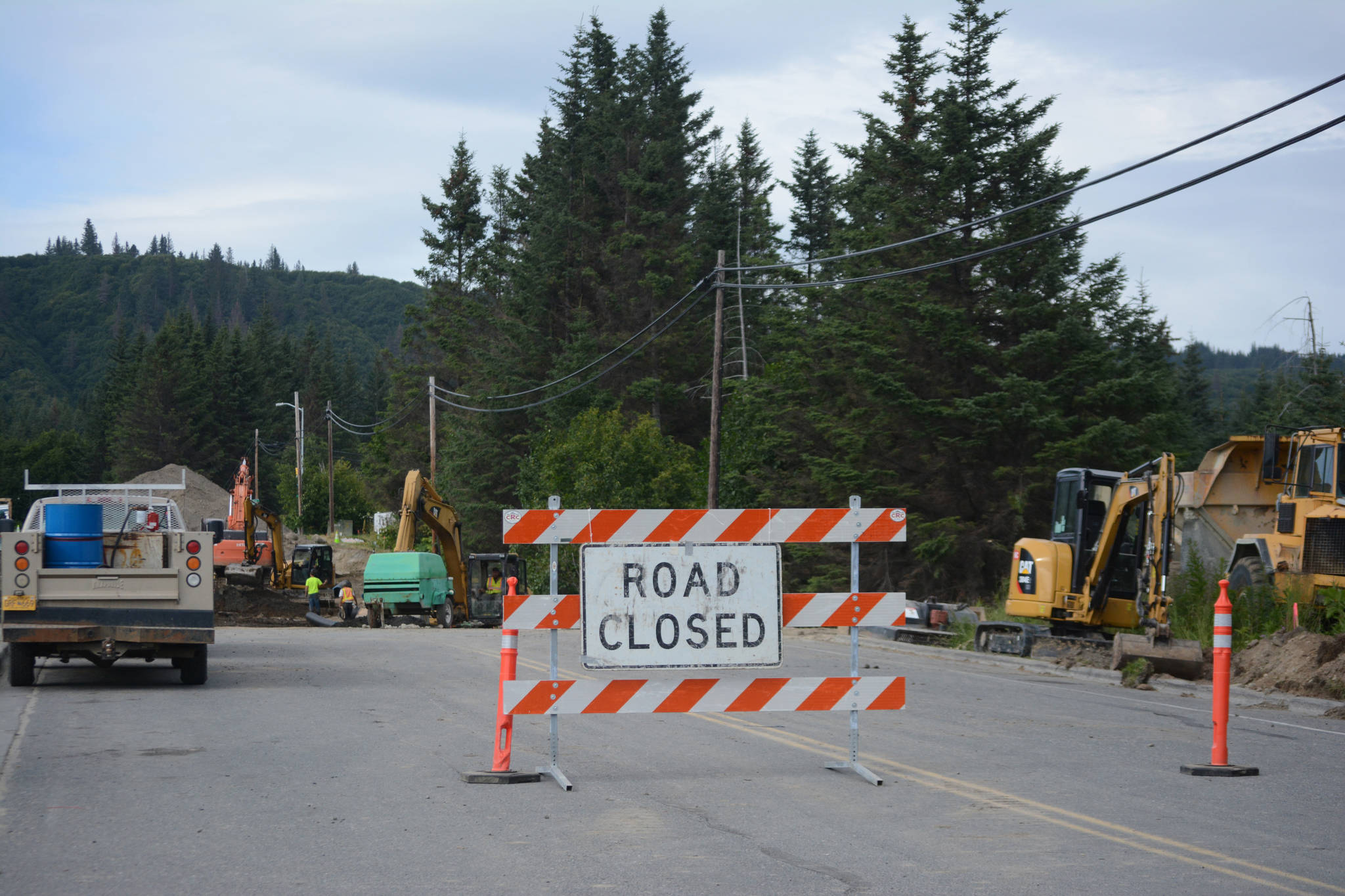 Crews with Clark Management of Anchor Point work on the Greatland Street extension near Sav-U-More on Wednesday, Aug. 1, 2018, in Homer, Alaska. The almost $600,000 project will connect Pioneer Avenue and the Homer Bypass through Greatland Street. (Homer News file photo)