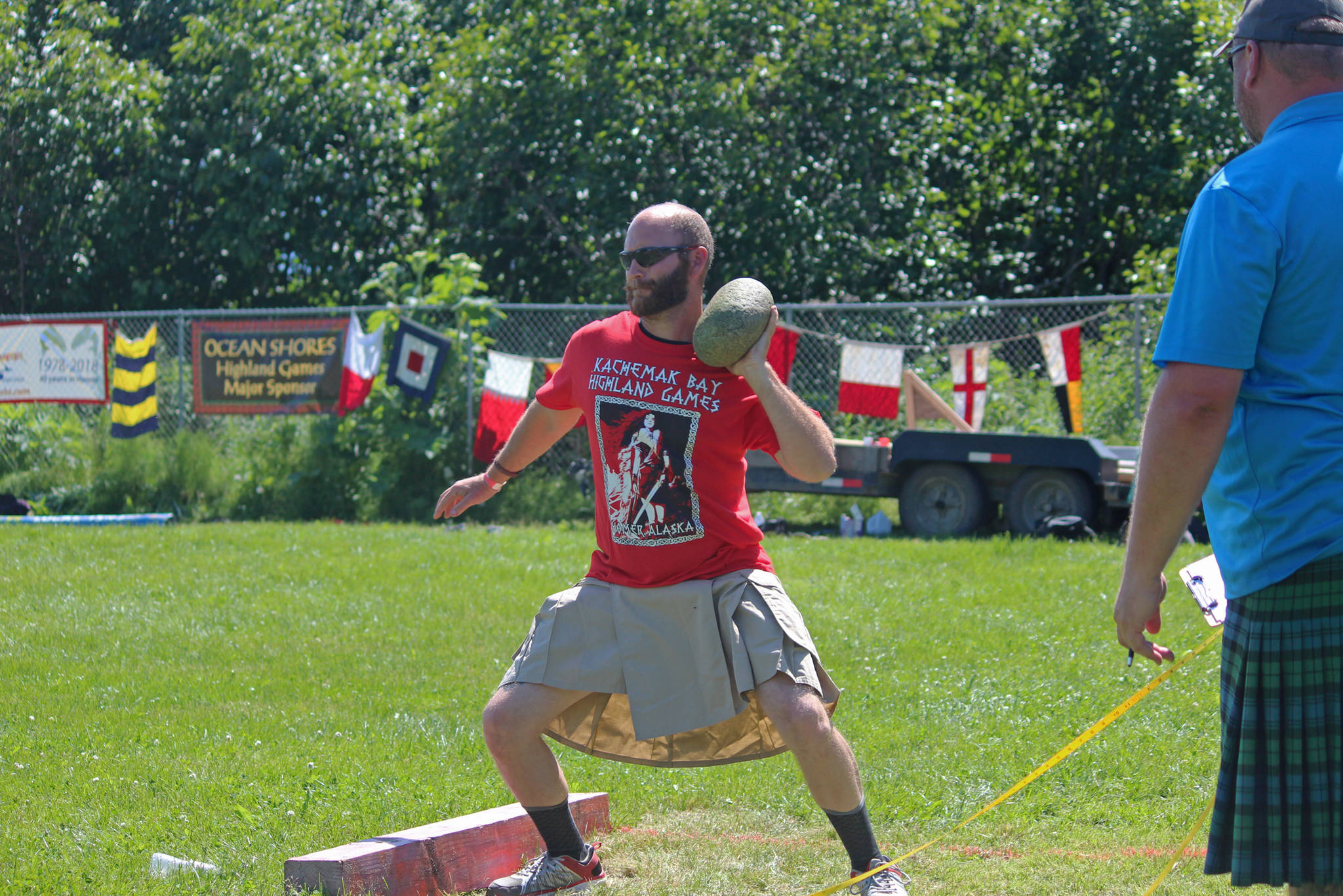 A novice competitor prepares to throw a braemar stone during the Kachemak Bay Scottish Highland Games on Saturday, July 7, 2018 at Karen Hornaday Park in Homer, Alaska. (Homer News file photo)
