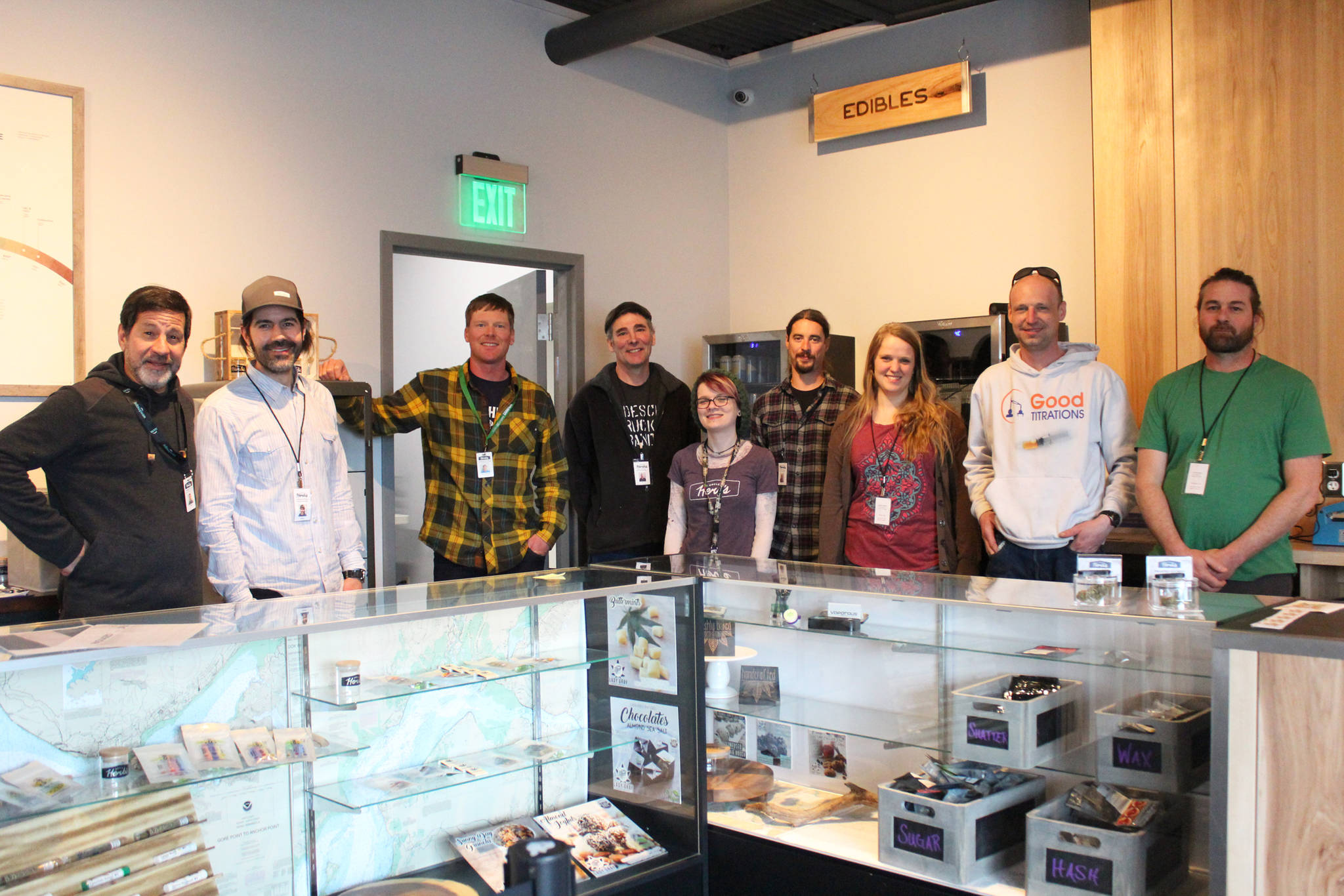 The staff of Uncle Herb’s, Homer’s first retail marijuana store, celebrate their opening day in June 2018. (Homer News file photo)
