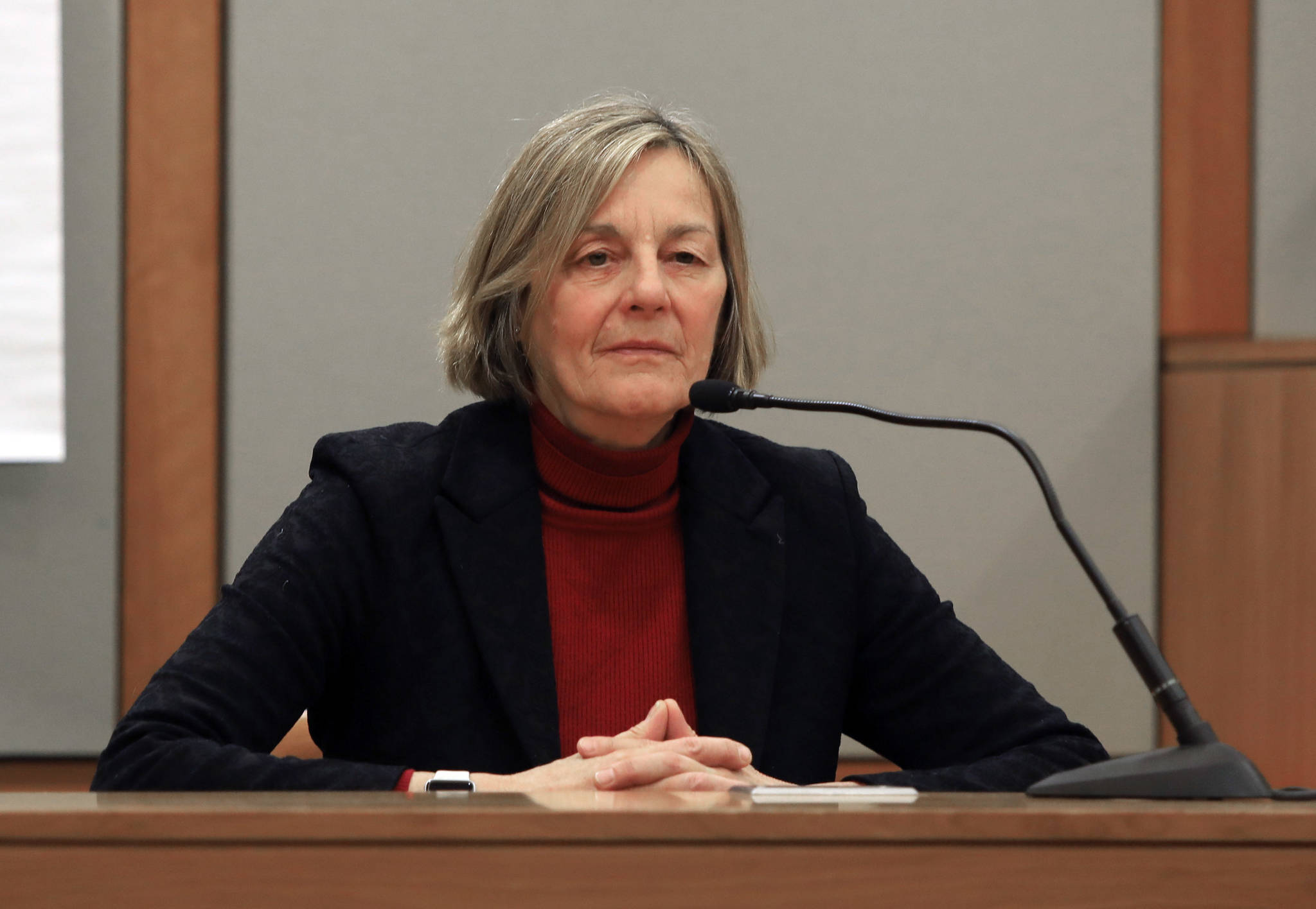 Kathryn Dodge, a candidate for an Alaska House of Representatives seat from Fairbanks, testifies in her lawsuit challenging results of a recount on Thursday, Dec. 20, 2018, in Anchorage, Alaska. The Alaska Supreme Court appointed Superior Court Judge Eric Aarseth as a special master to prepare a report on the appeal of a recount of in the race between Dodge, a Democrat, and Republican Bart LeBon. LeBon held a one-vote lead after the recount. (AP Photo/Dan Joling)