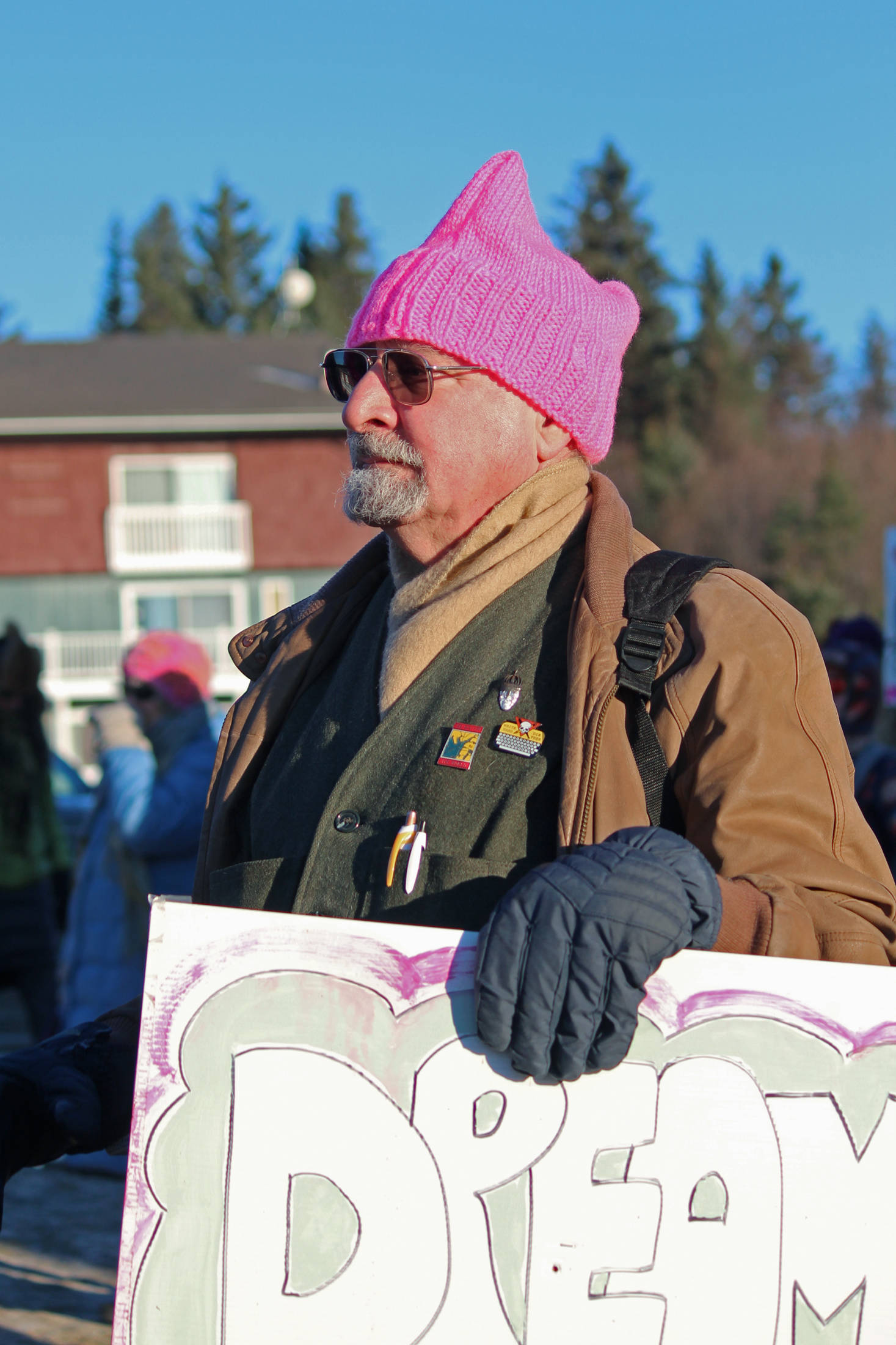 A 2019 Women’s March on Homer participant holds a sign while listening to speakers Saturday, Jan. 19, 2019 at the Homer Education and Recreation Complex in Homer, Alaska. (Photo by Megan Pacer/Homer News)