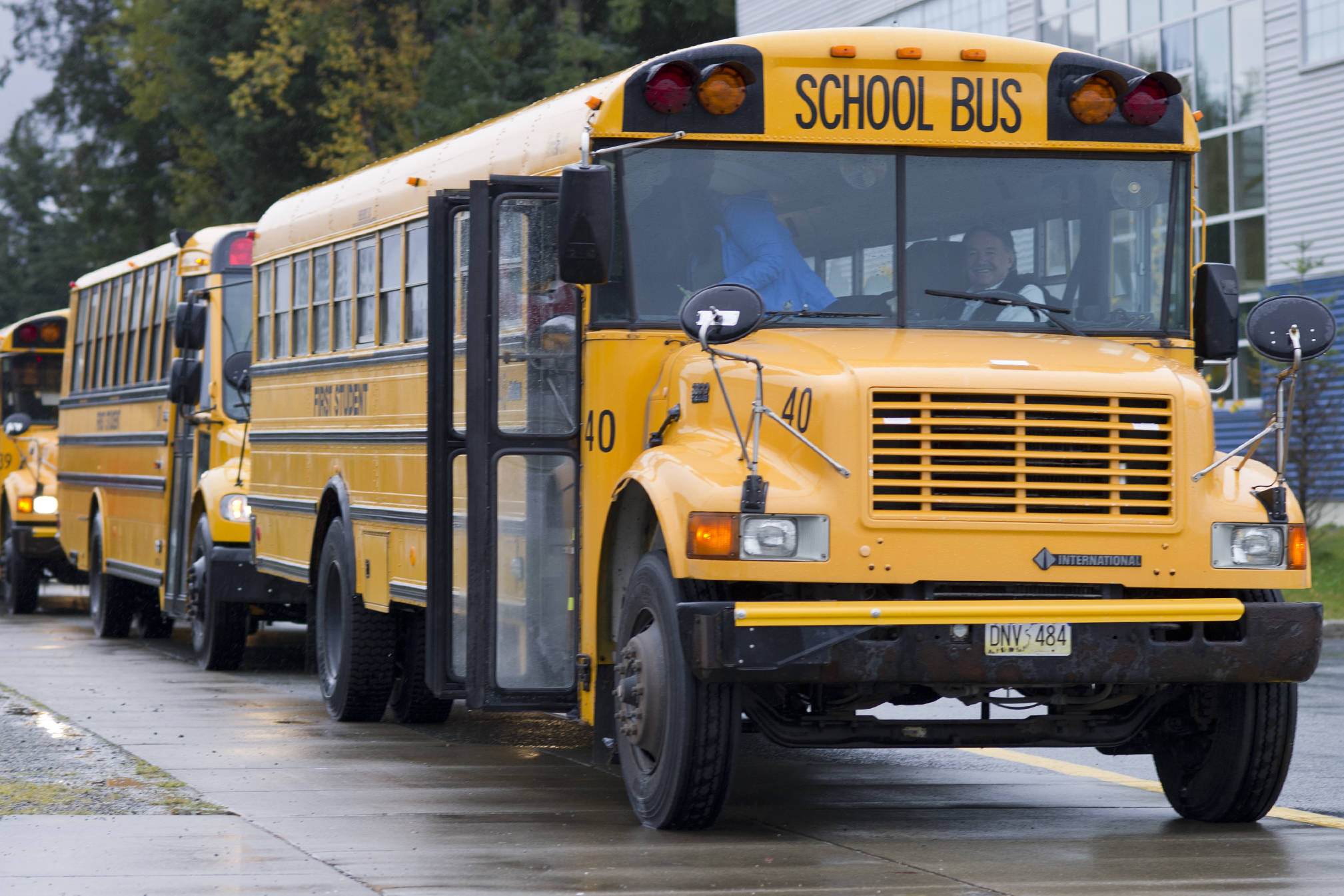 School buses drop students off at Thunder Mountain High School on Monday, Sept. 21, 2015. (Michael Penn | Juneau Empire)