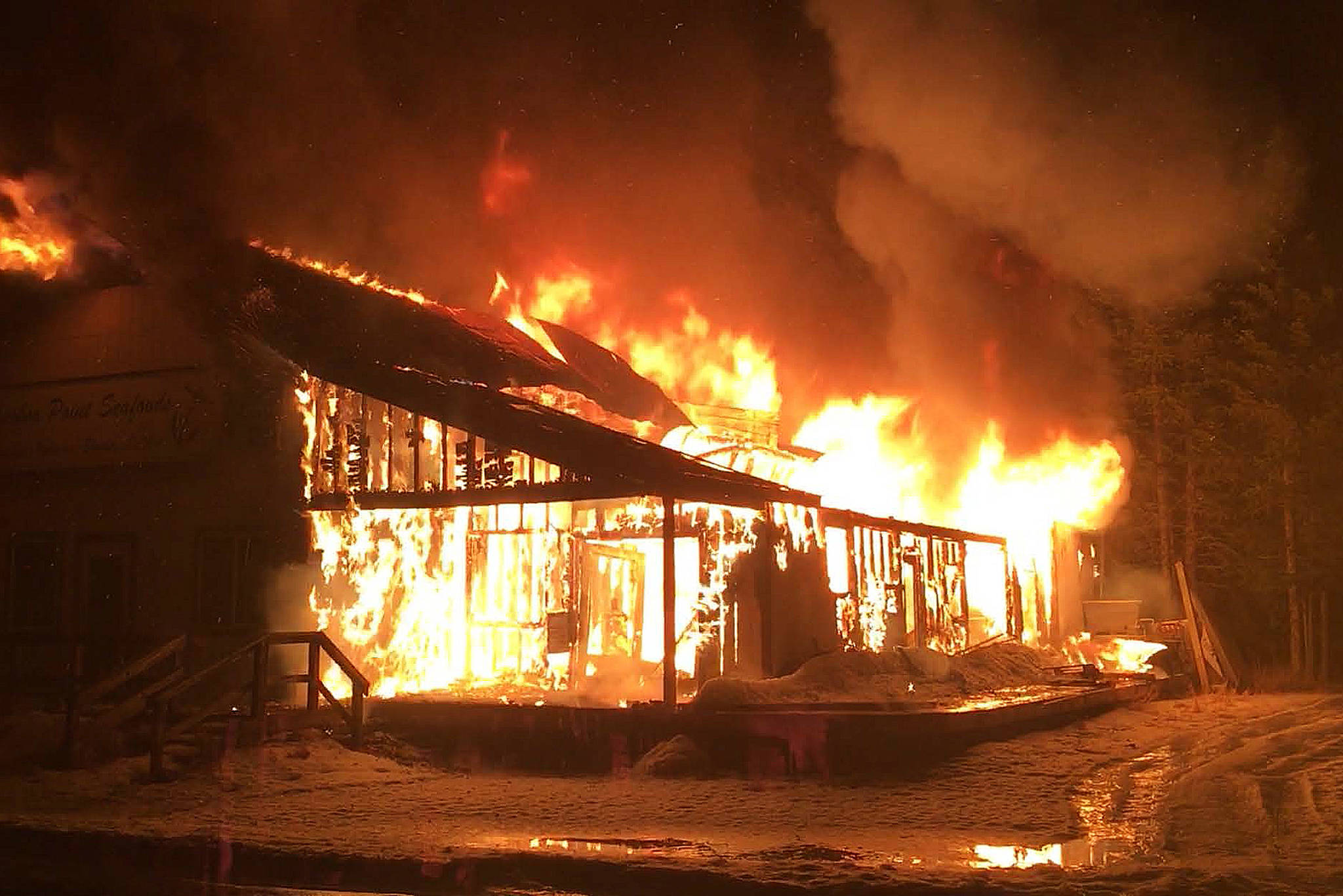 The former location of Anchor Point Seafoods sits ablaze Saturday, Jan. 26, 2019 on North Fork Road in Anchor Point, Alaska. (Photo courtesy Anchor Point Emergency Services)